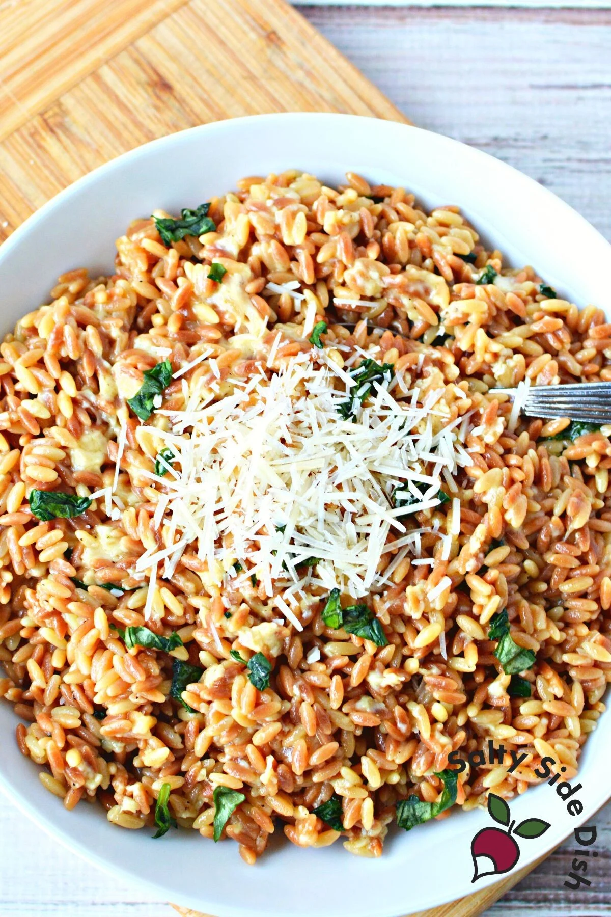 plate of orzo with parmesan and basil.