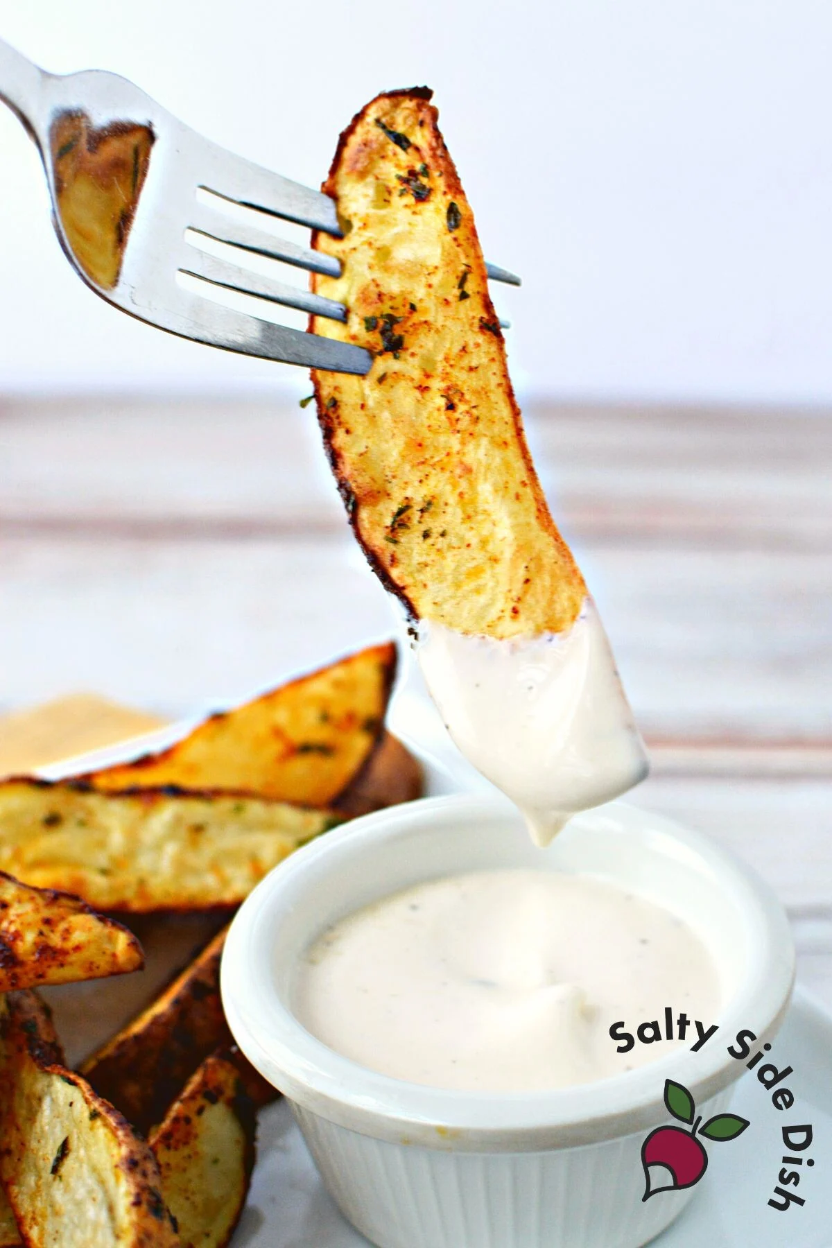 ranch dressing with potato wedges.