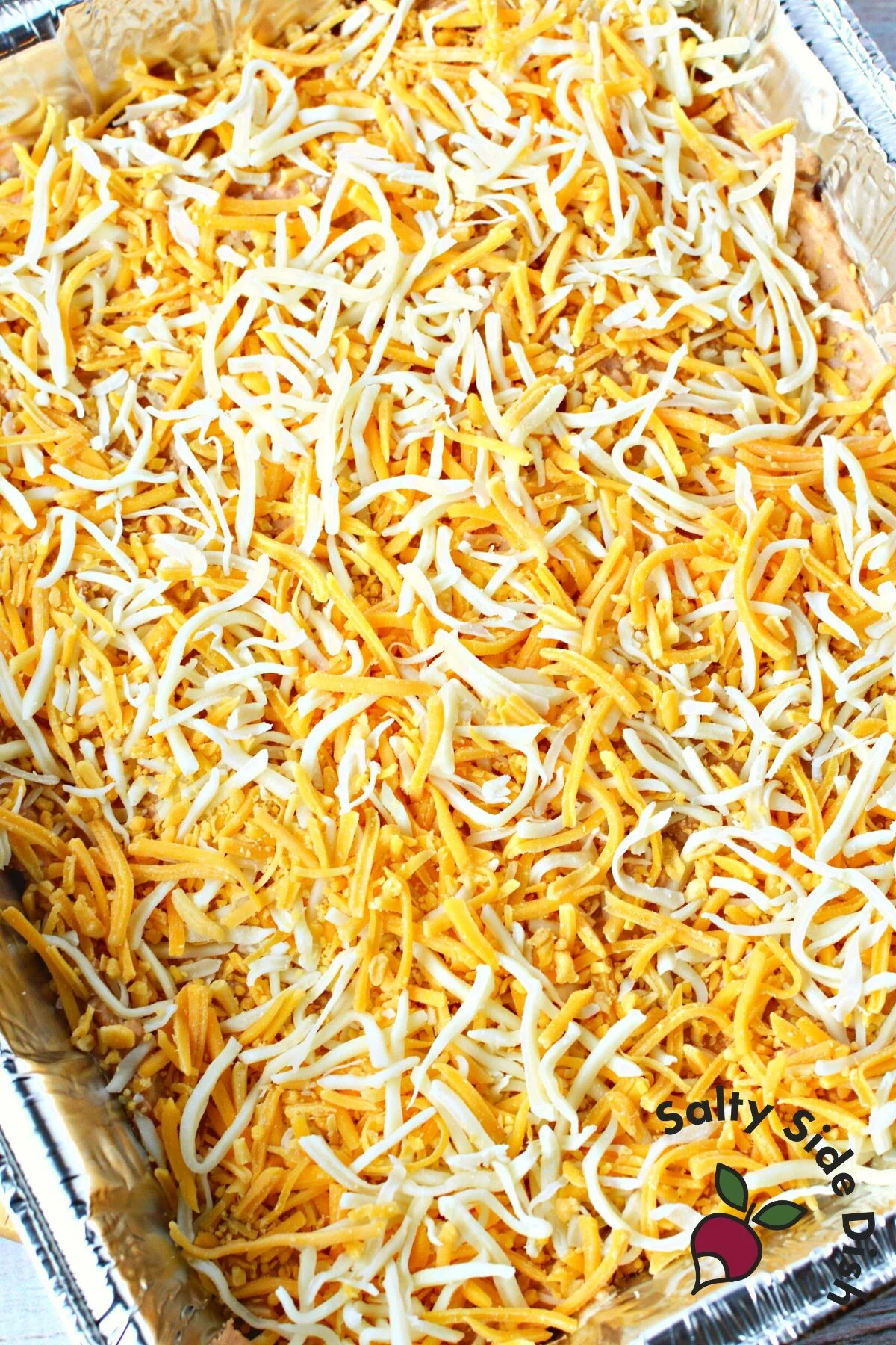 layers of cheese on a dip recipe.