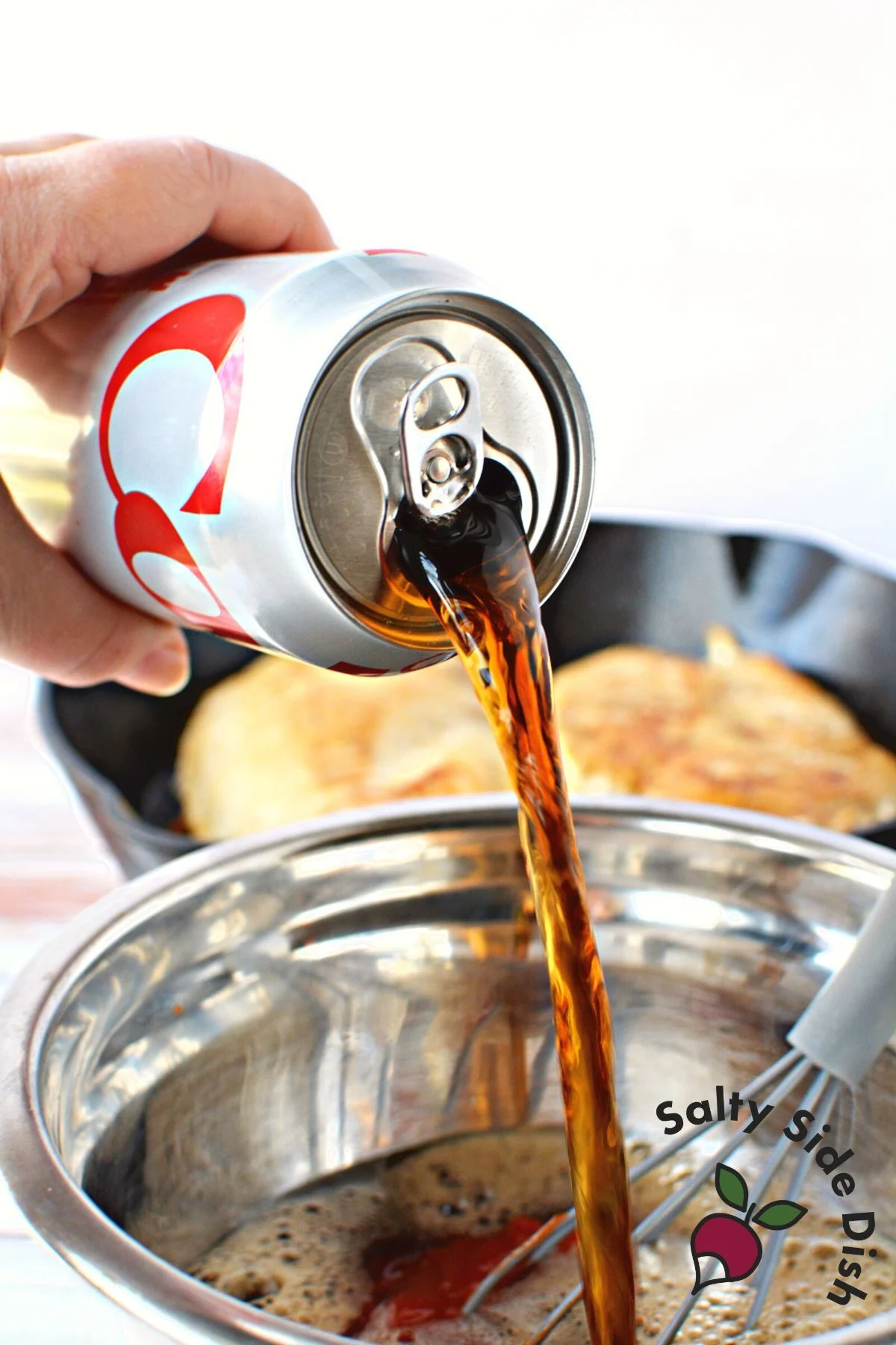 pouring can of diet coke.