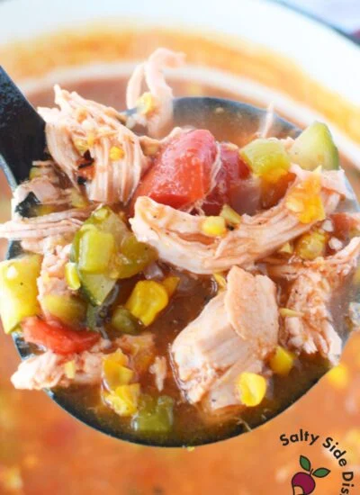 close up of chicken enchilada soup with zucchini and corn.