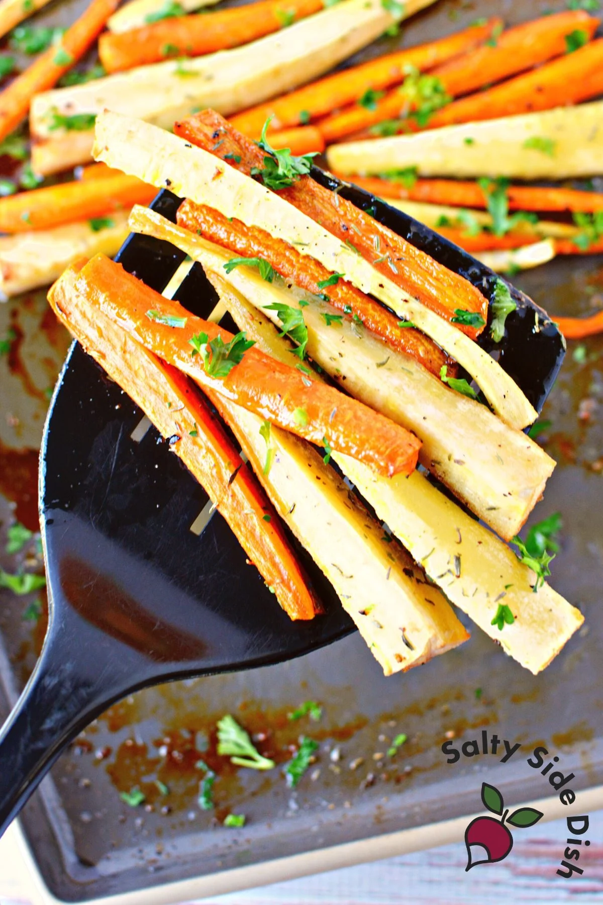 spatula holding roasted vegetables