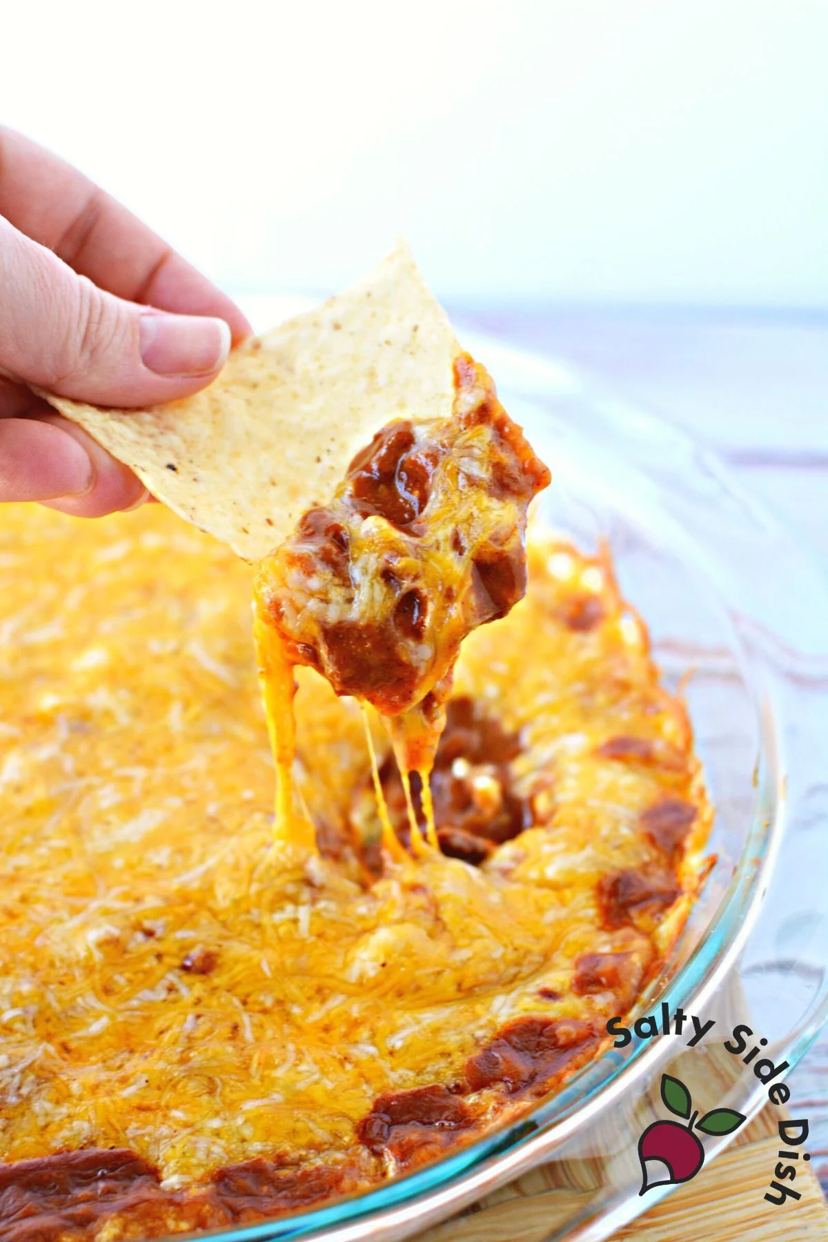 cheesy hormel dip on a tortilla chip.