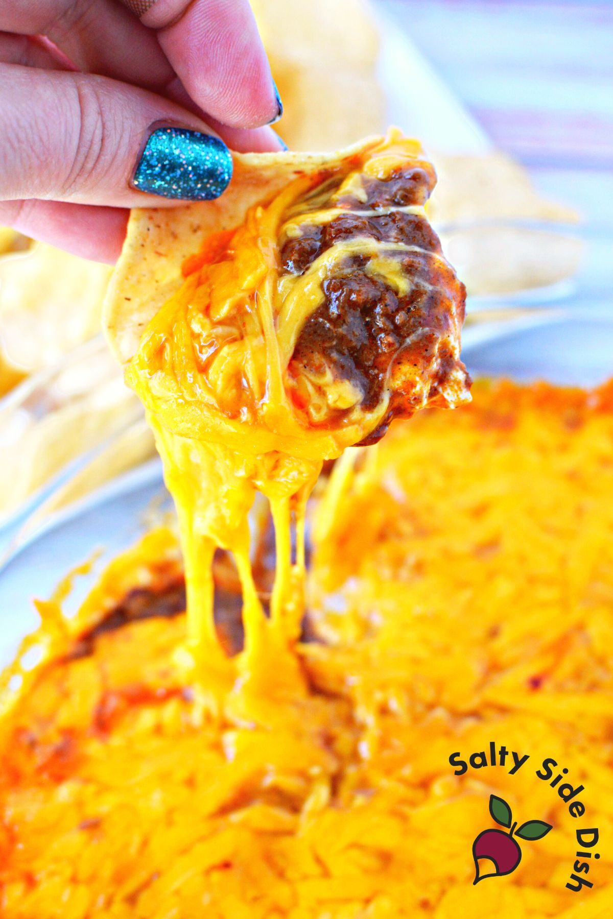 perfect chili dip on a tortilla chip.