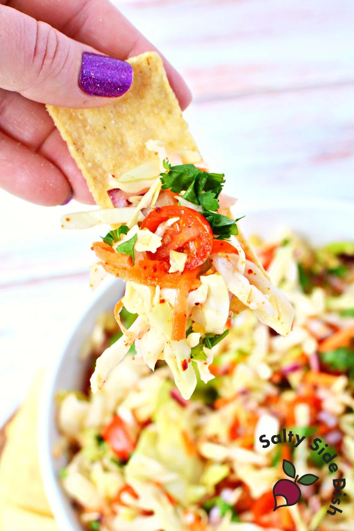 serving salsa on chips.