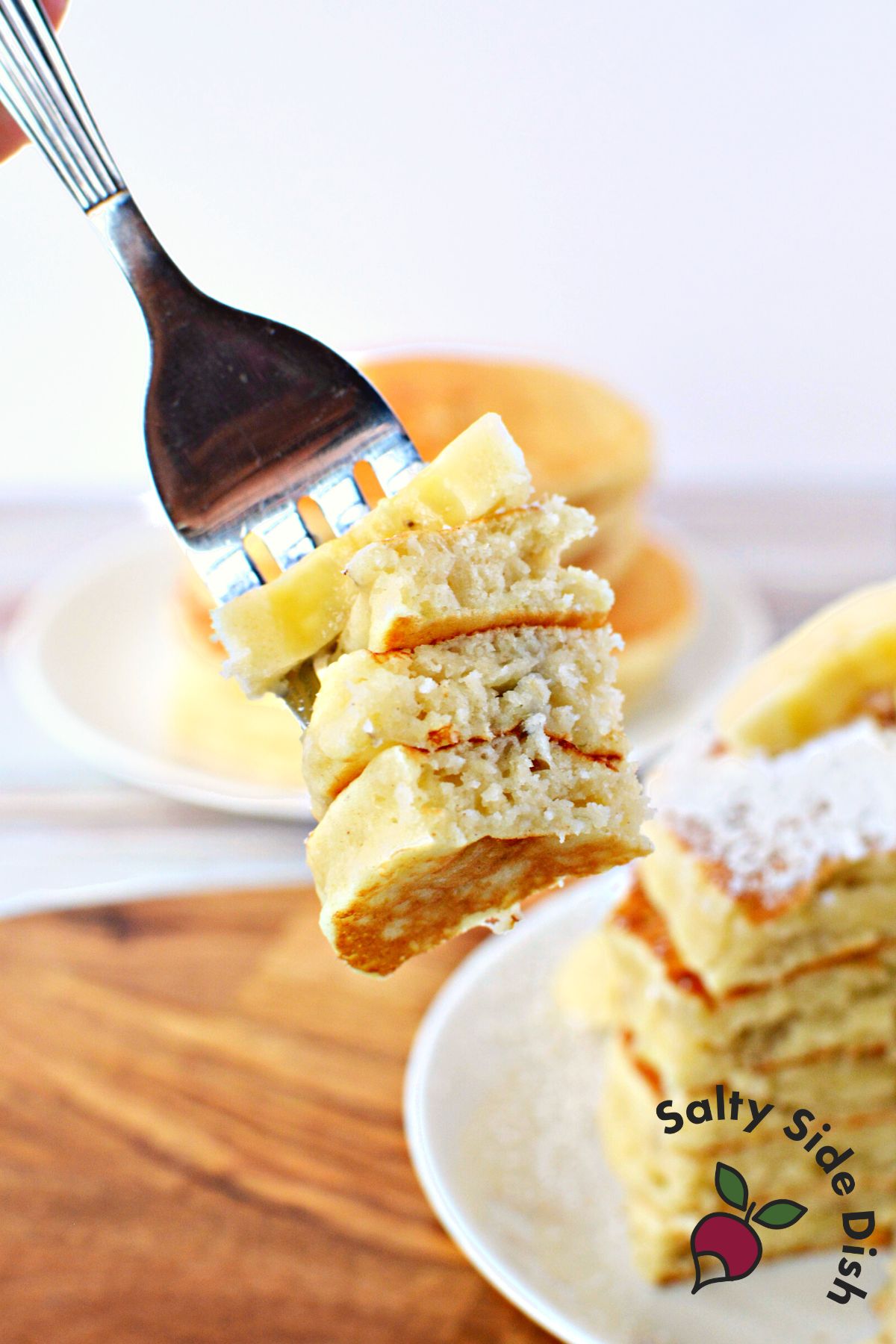 stack of pancakes on a fork.
