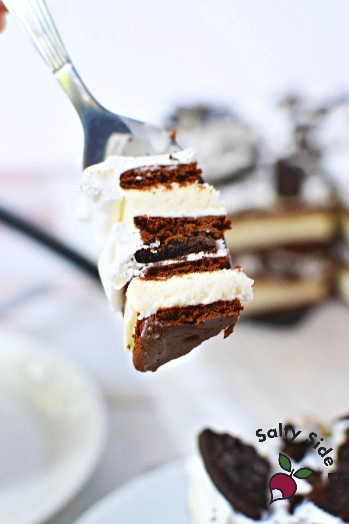 a fork full of ice cream cake.