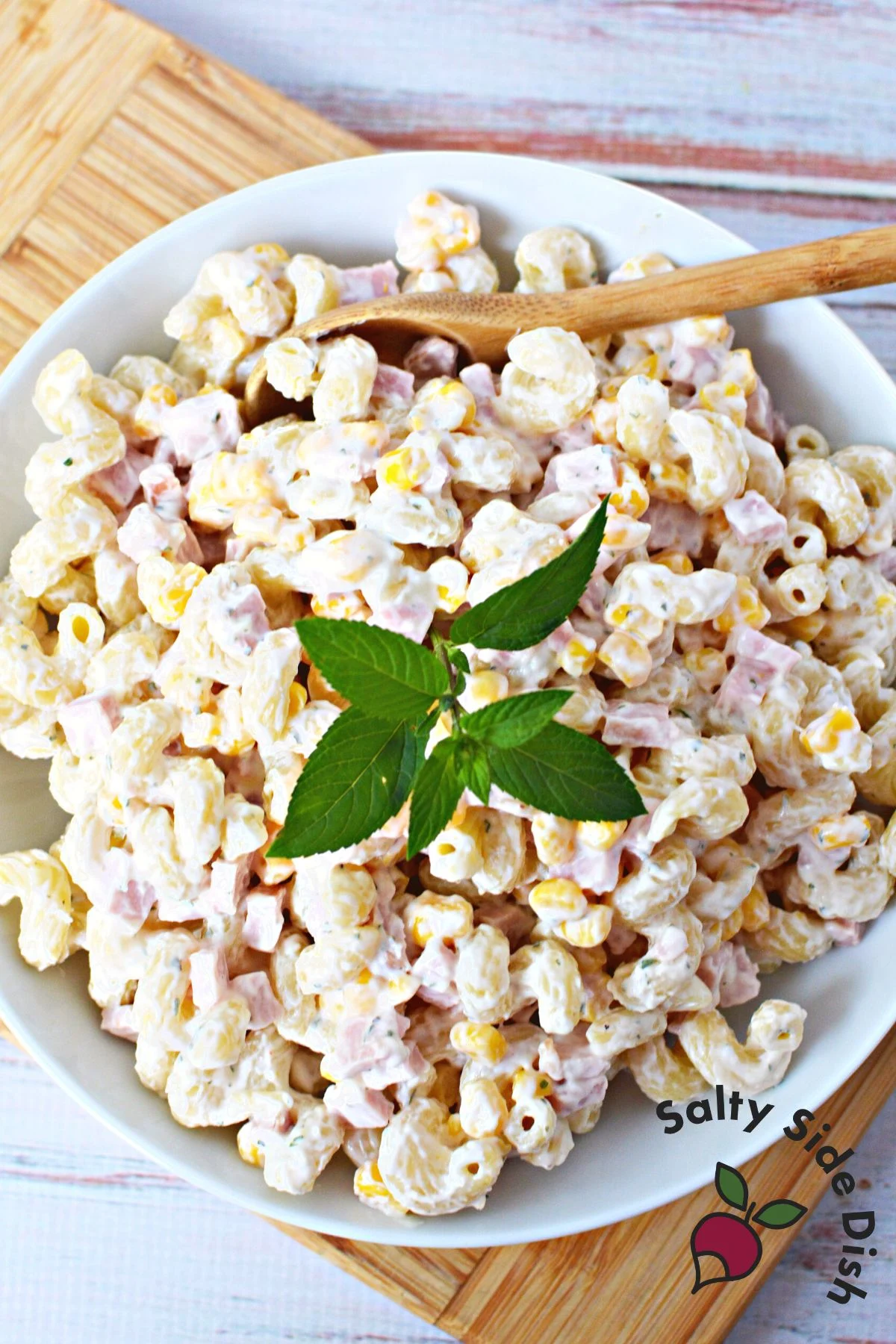 left over ham salad on a white plate.