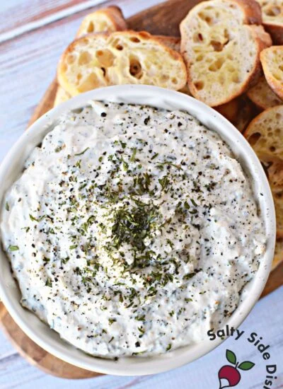 plate of roasted garlic dip in a bowl.