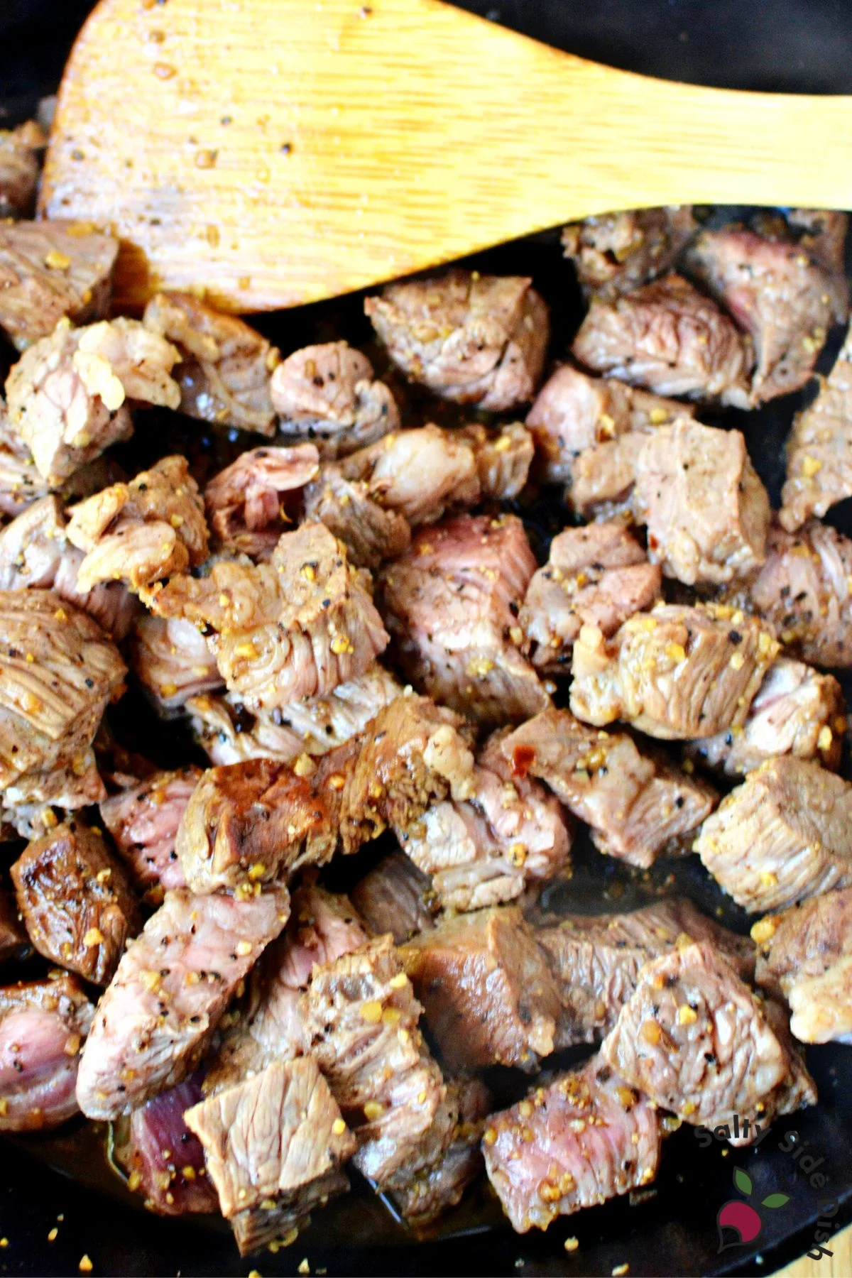 brown pot roast in cast iron pan.