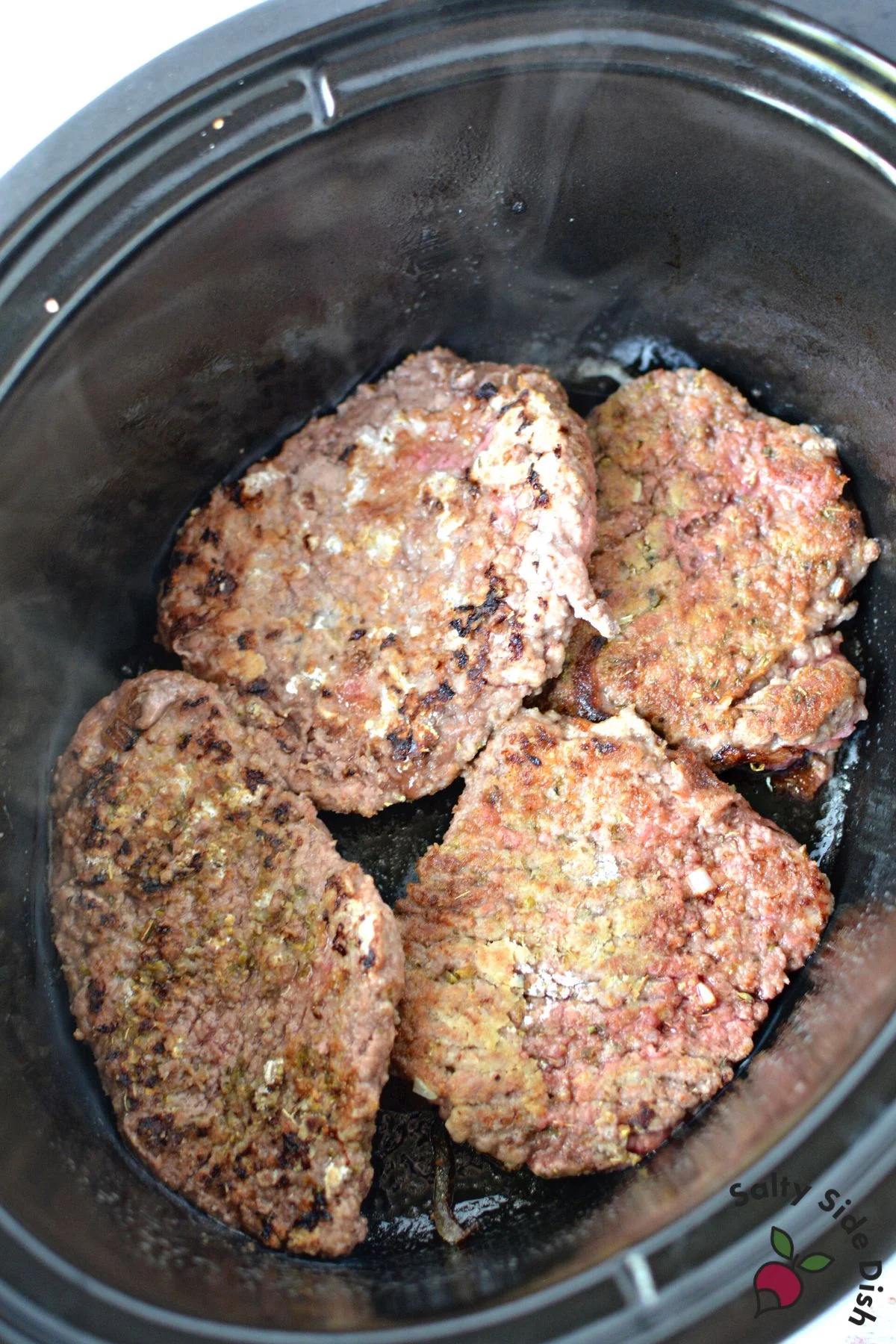 add 4 cubed steaks to slow cooker.