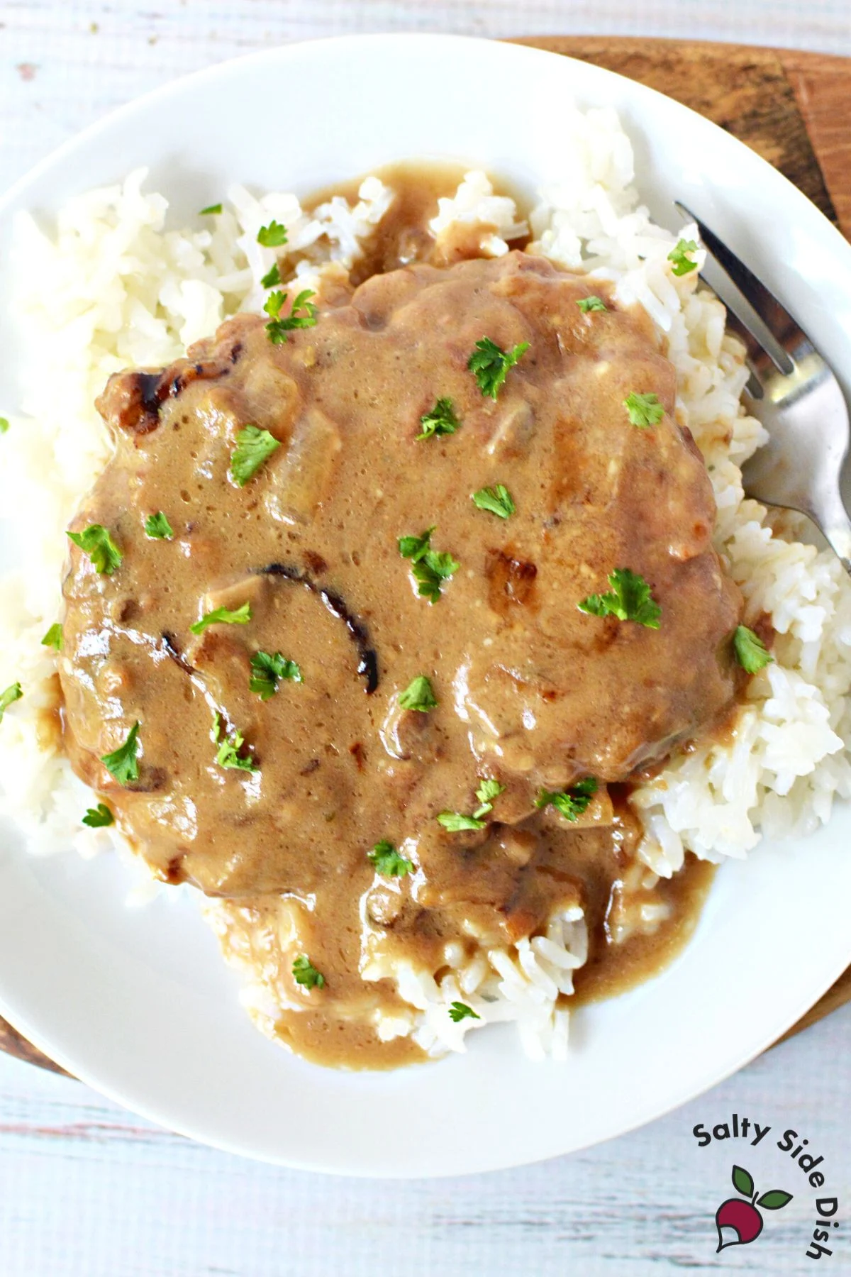 serving up a perfect plate of beef, rice, and gravy.