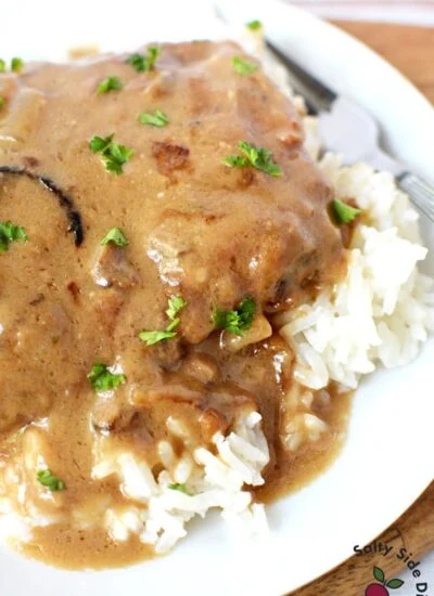 cubed steak dinner and rice.