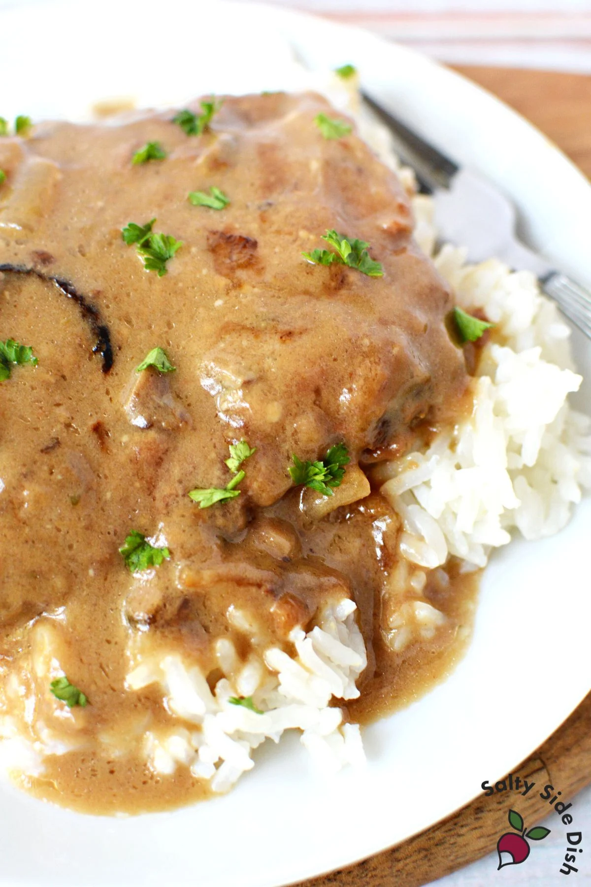cubed steak dinner and rice.
