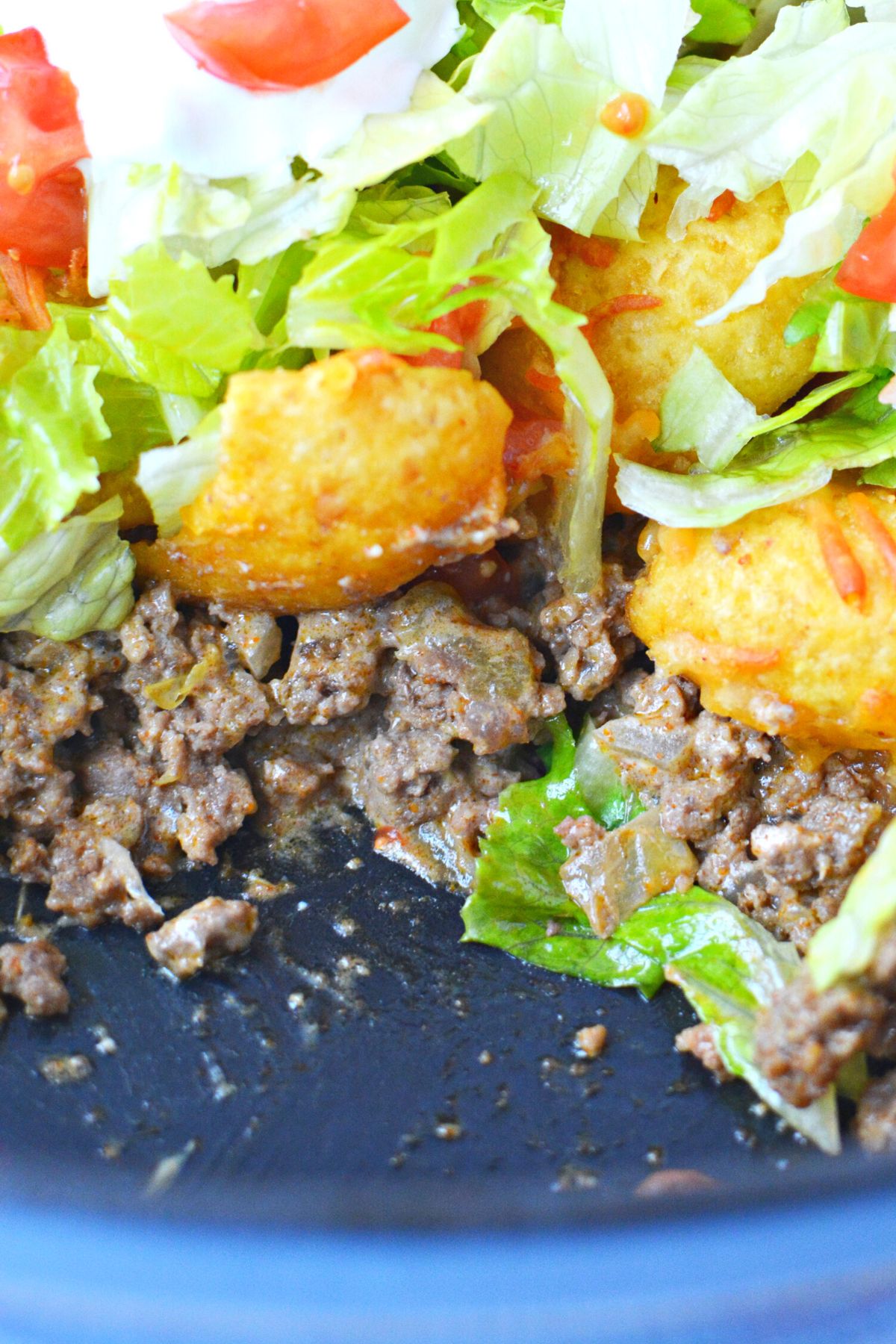 creamy meat mixture for taco casserole recipe, up close.