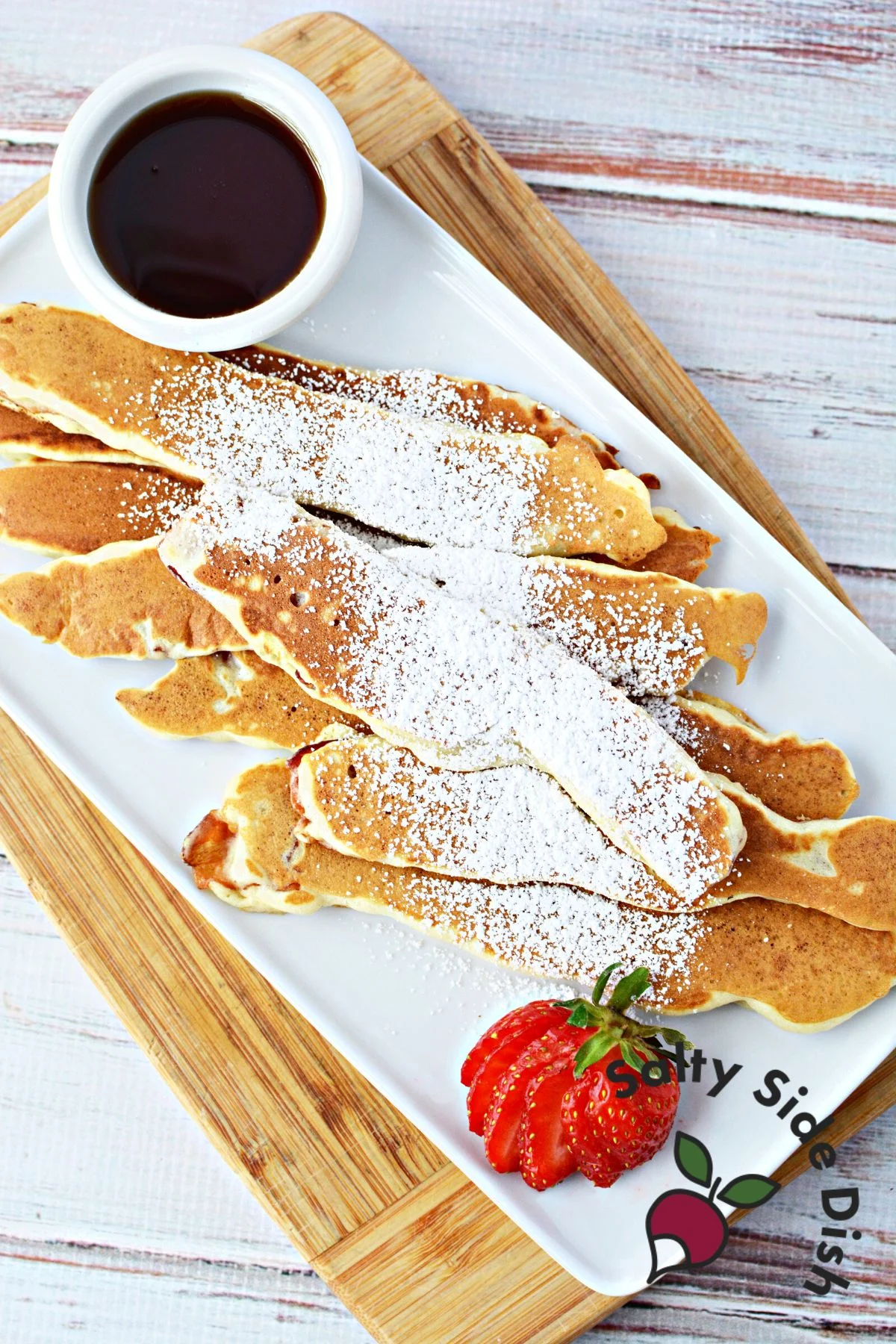 bacon pancake dippers on a plate.