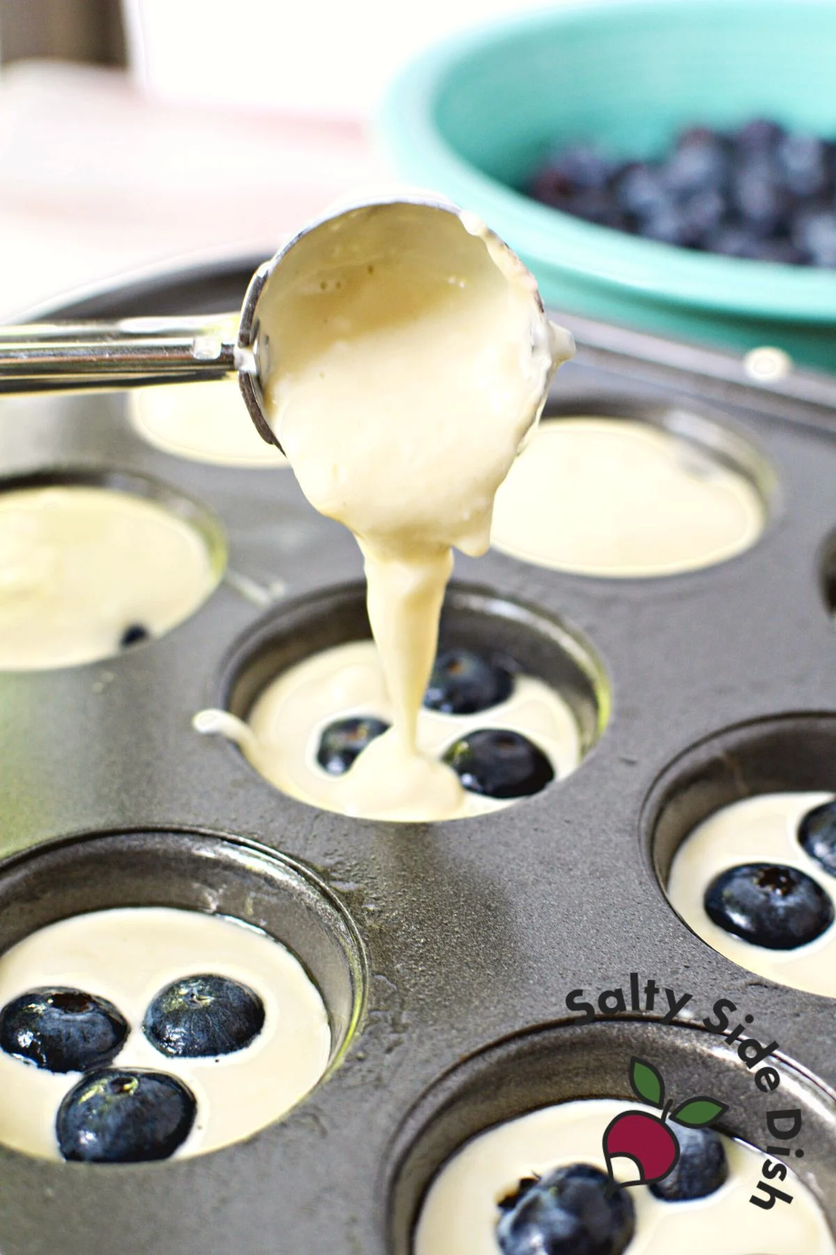 adding mini muffin pancake batter.