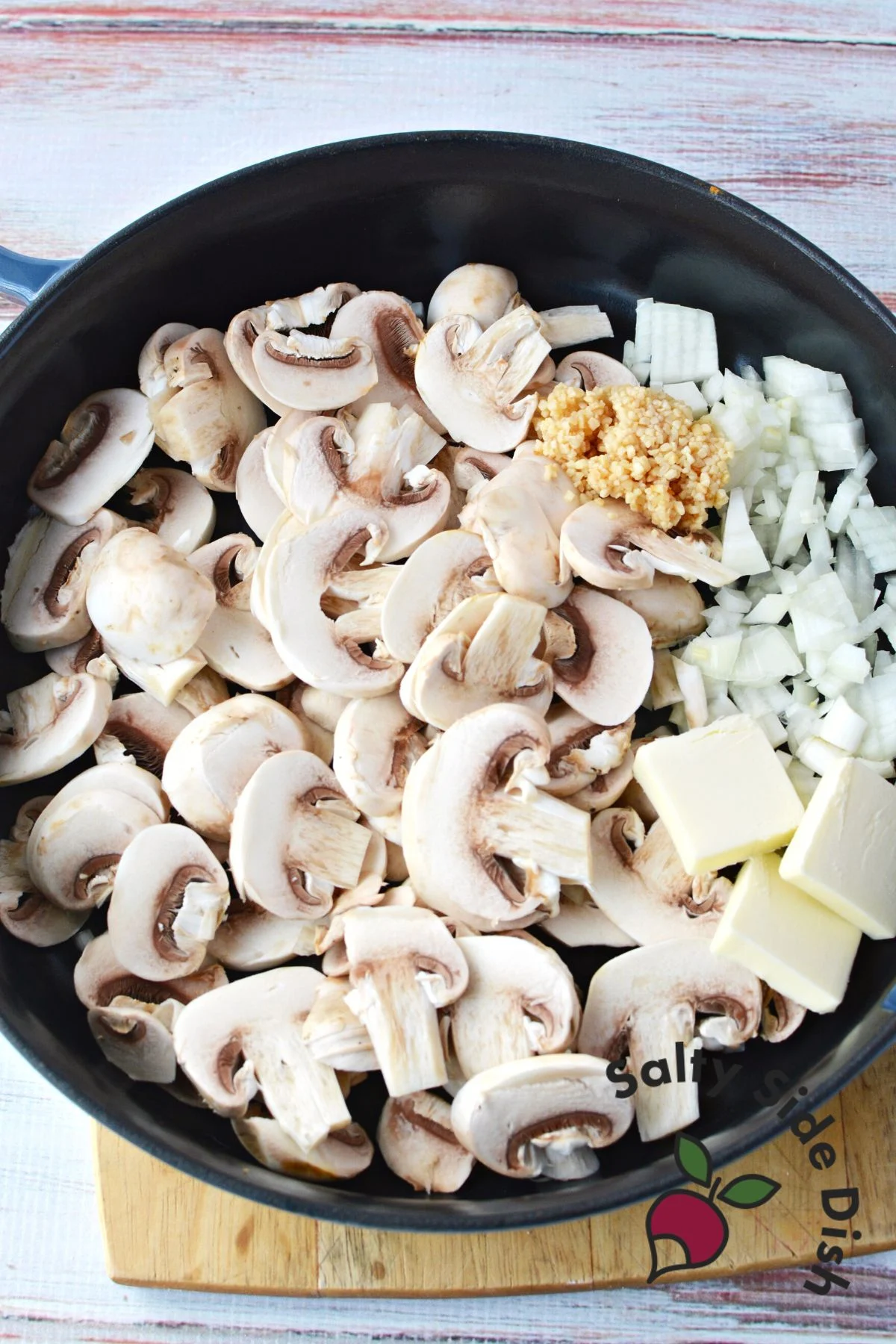 mushrooms, garlic, onions and butter in a cast iron pan.