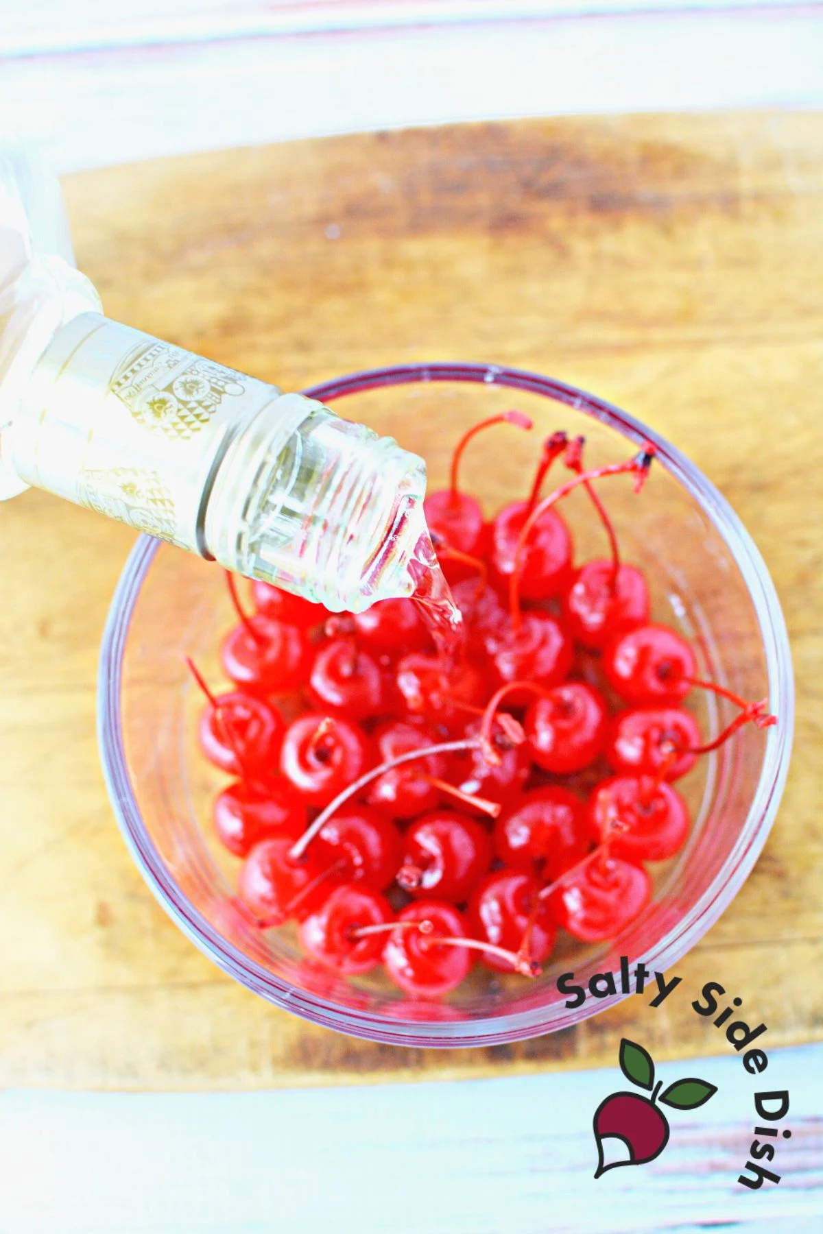 pouring vodka in cherries