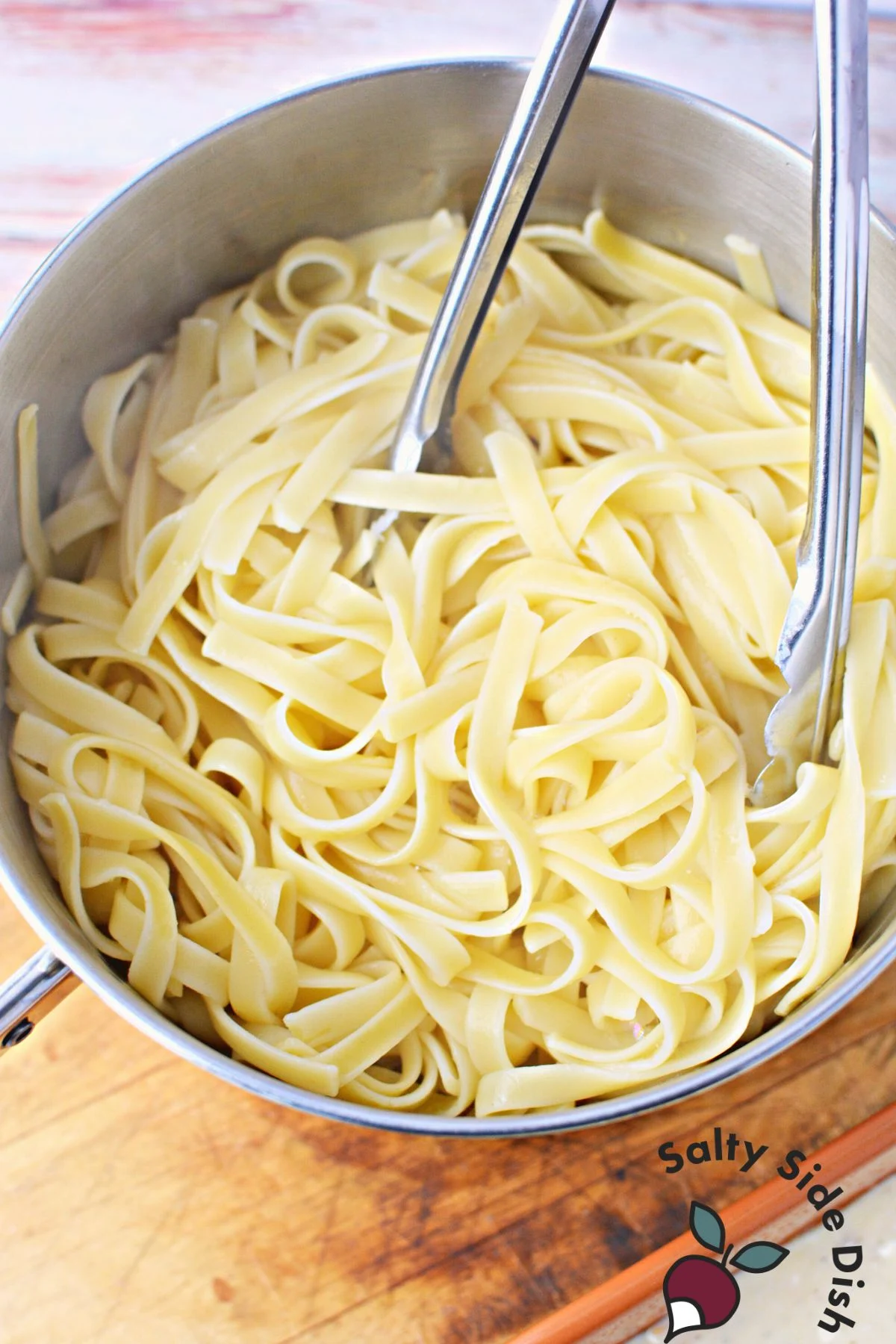 cooked pasta in a pan.