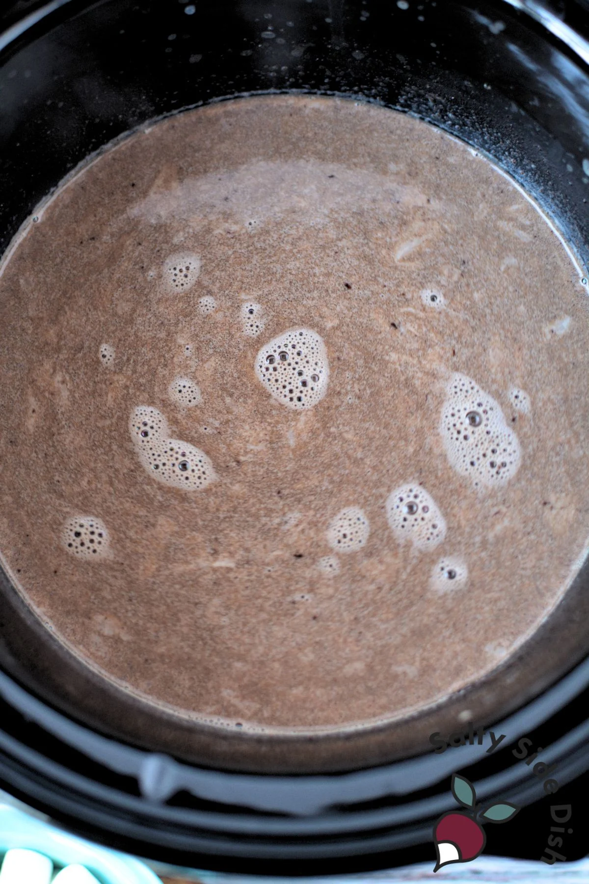 homemade hot chocolate sitting in a crockpot.