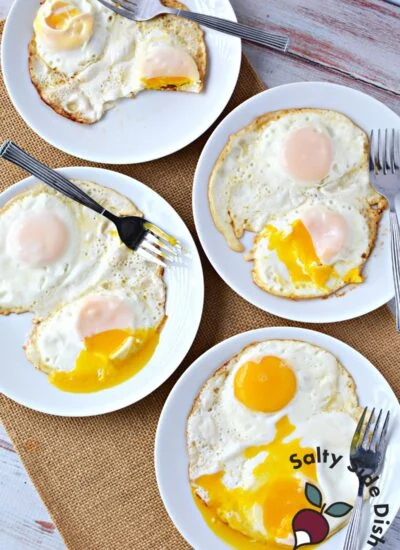 Sunny side up, over-easy, over-medium, and over-hard eggs in different plates.