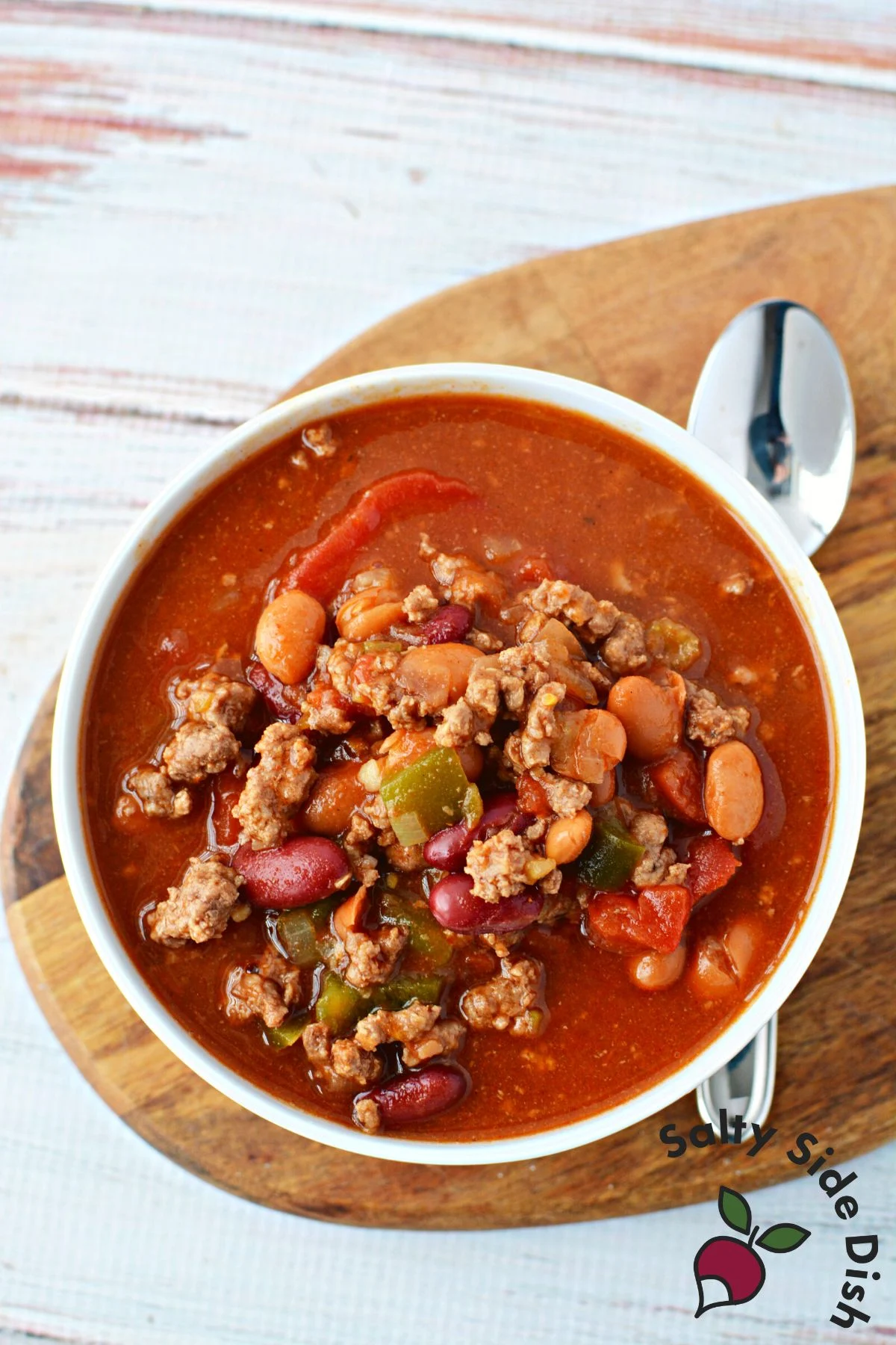bowl of chili with a spoon.
