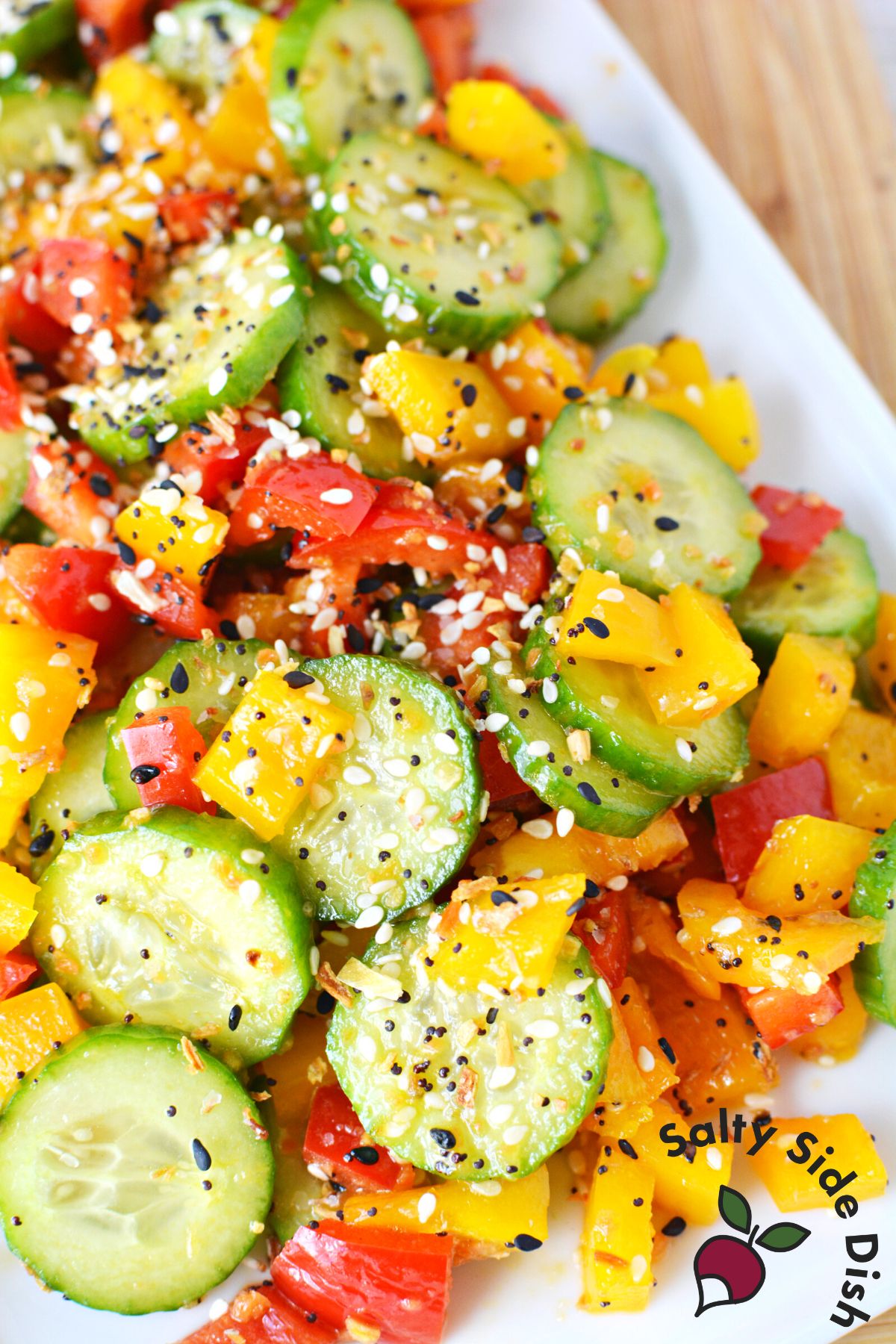large plate of tiktok famous bell pepper and cucumber salad.