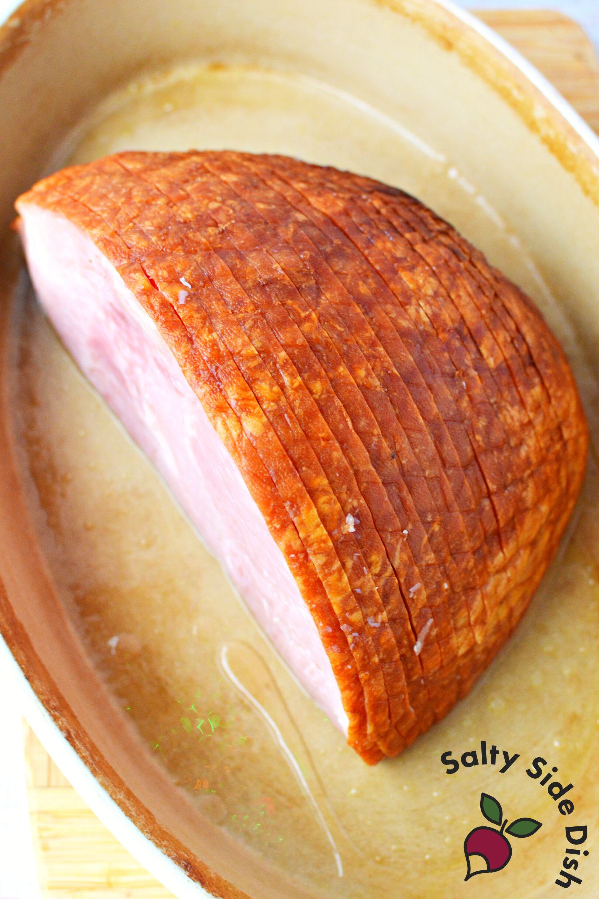 spiral baked ham with casserole dish.
