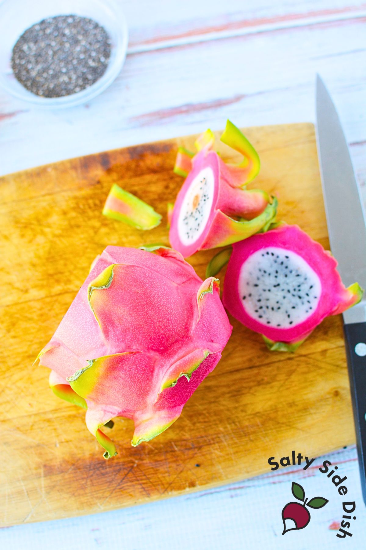 full size of dragon fruit on a cutting board.