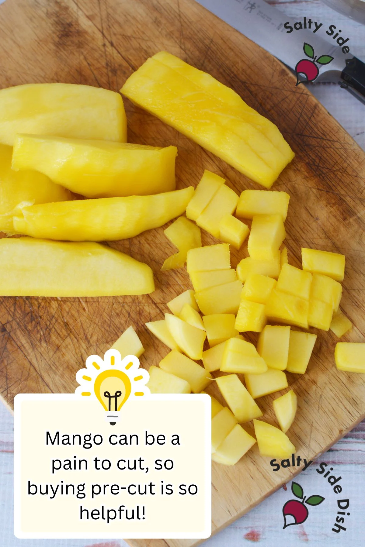 mango sliced on a cutting board with tip for buying premade.