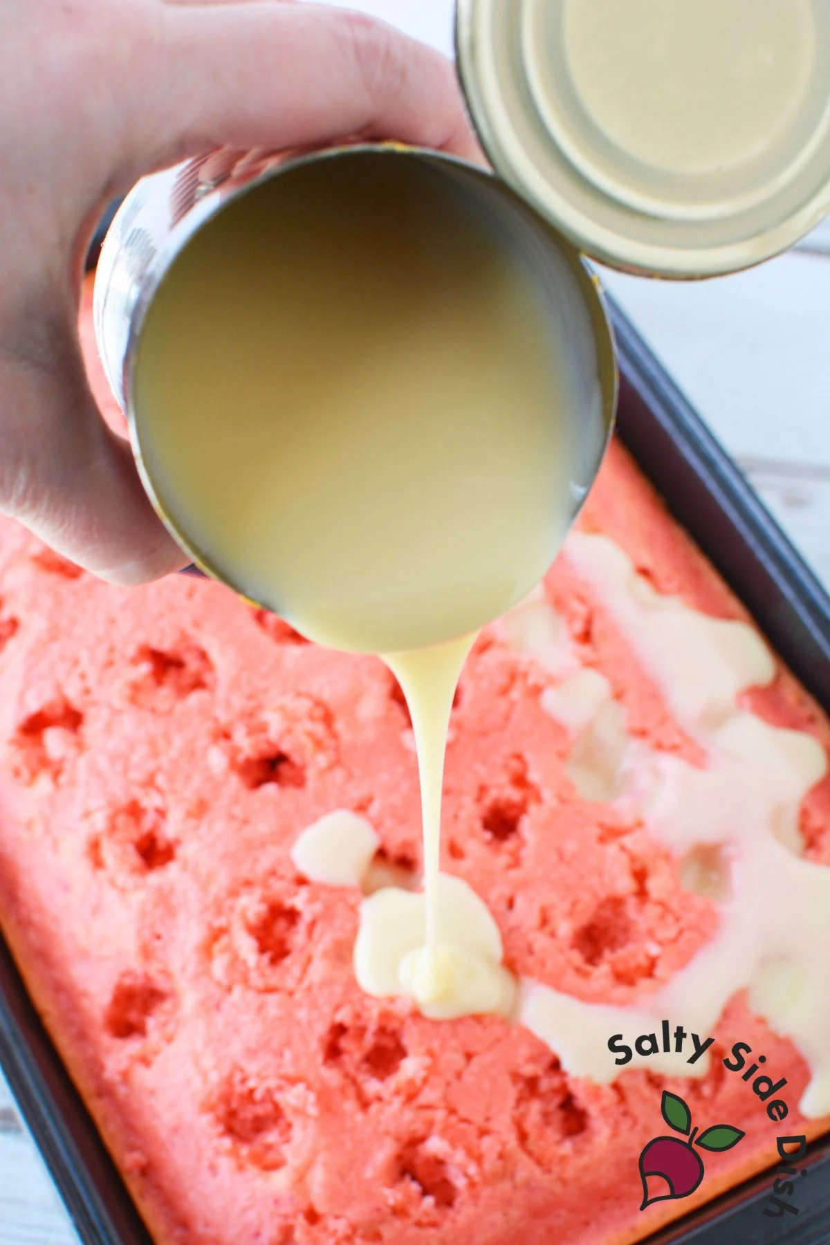enhance boxed cake mix by pouring in syrup or condensed milk.