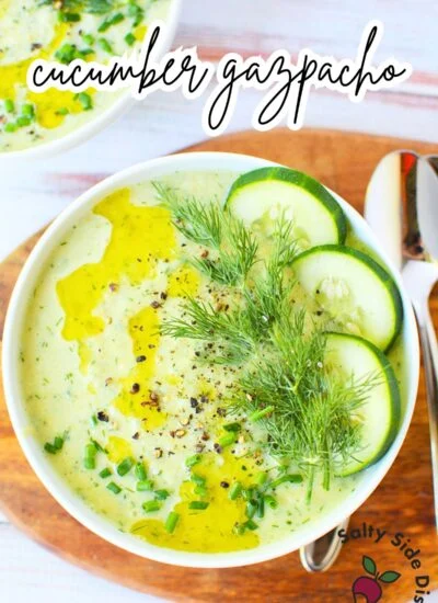 Fresh cucumber gazpacho served in a bowl with dill and chives.