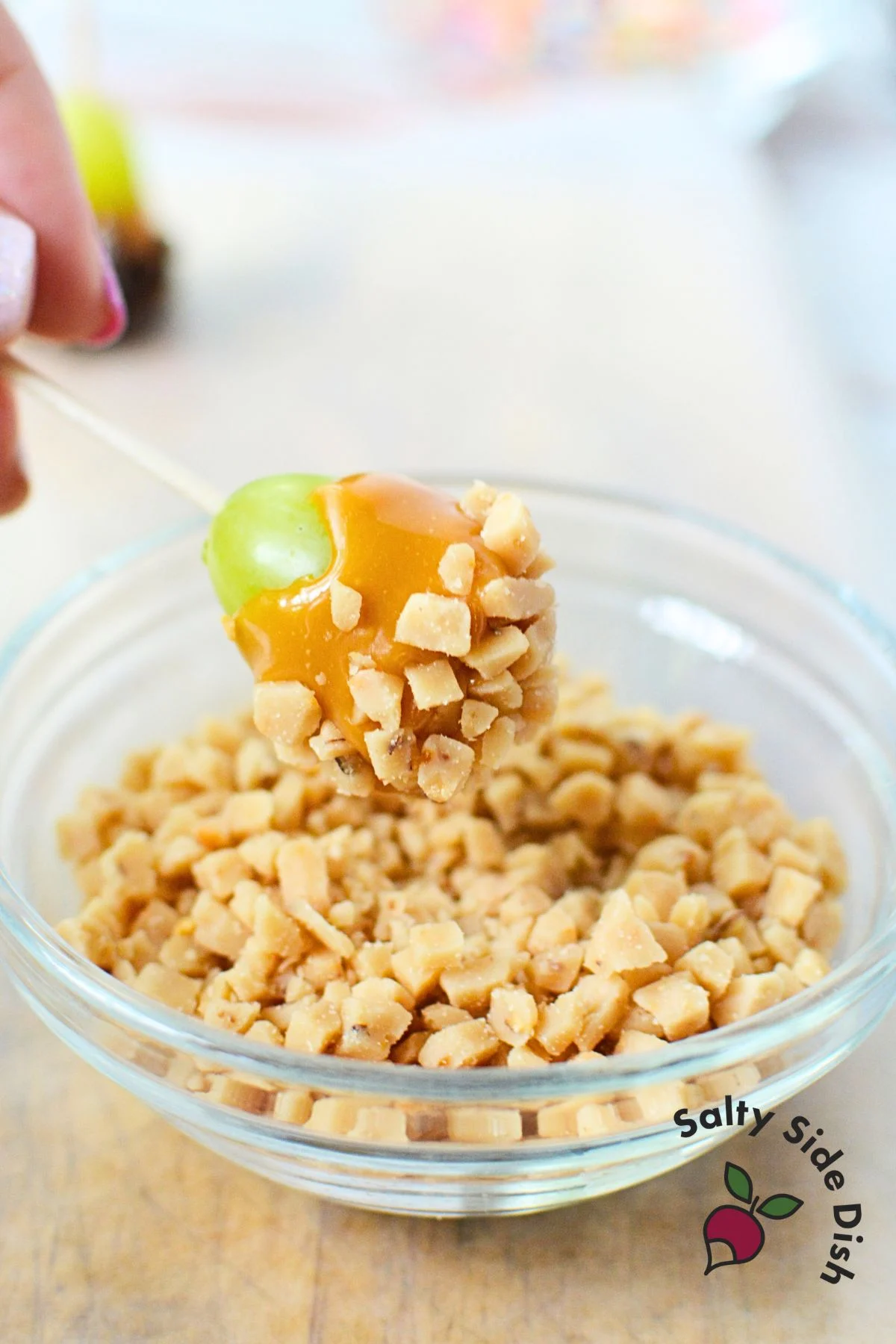 Step-by-step process of making caramel apple grapes.