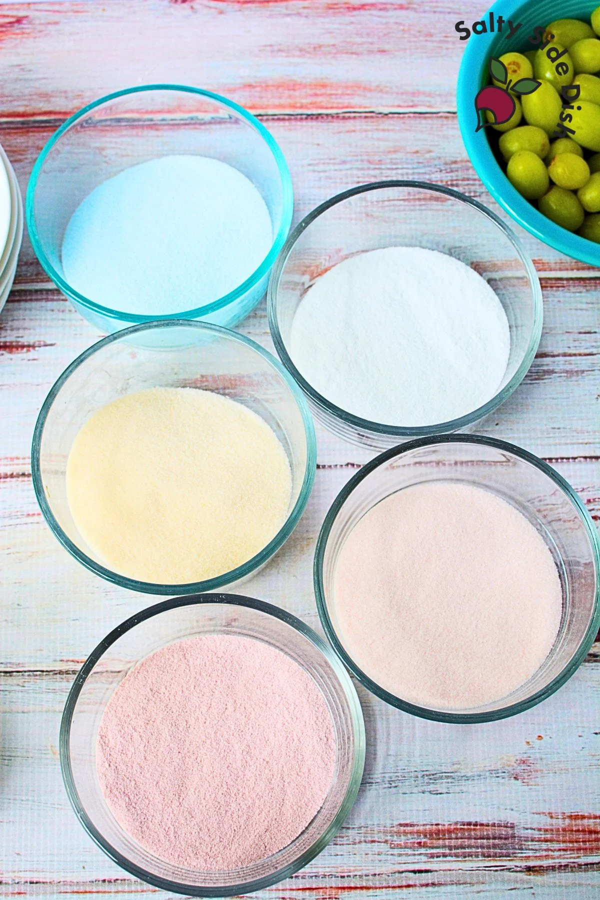 add Jell-O gelatin flavors in various colors in bowls.