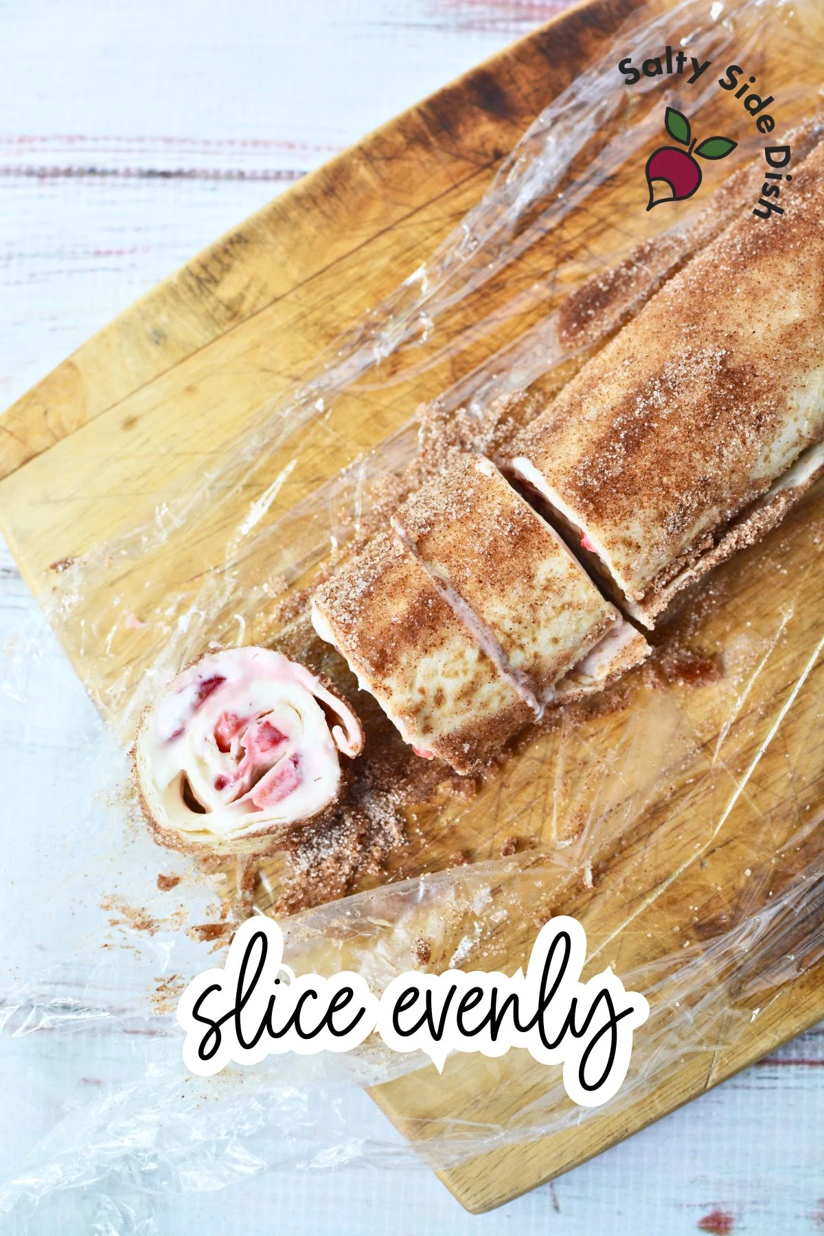 Cheesecake roll-ups sliced into pinwheels on a serving platter
