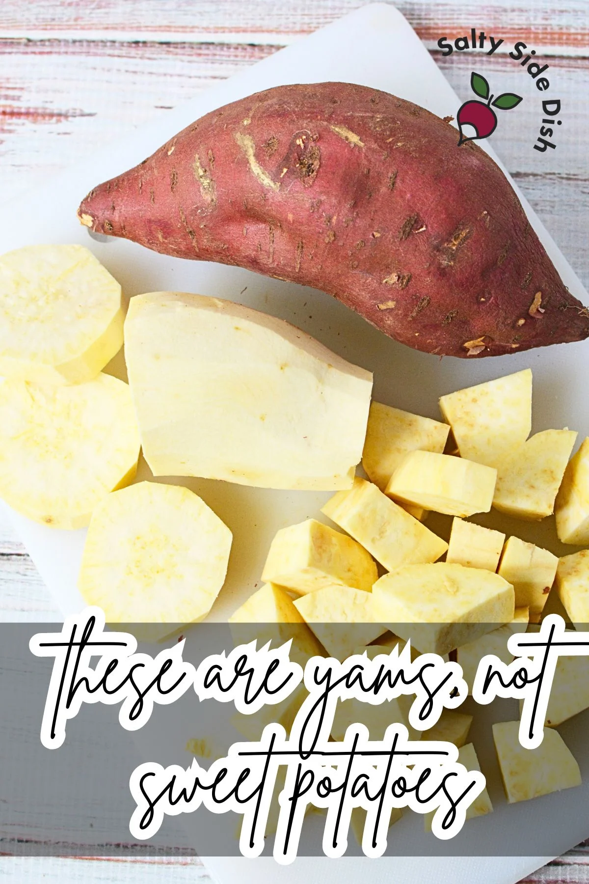 Yams on a cutting board in 1 inch chunks.