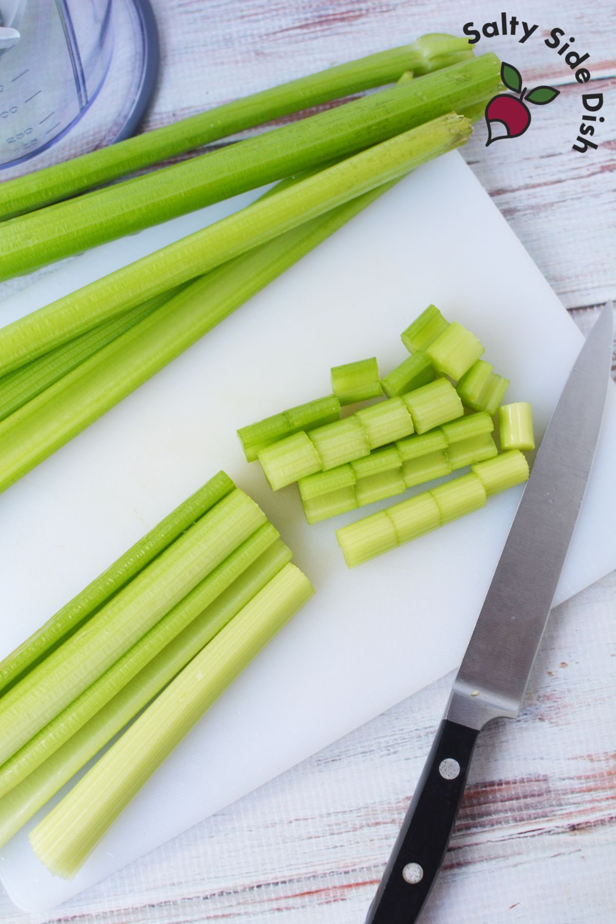 cutting up celery stalks.