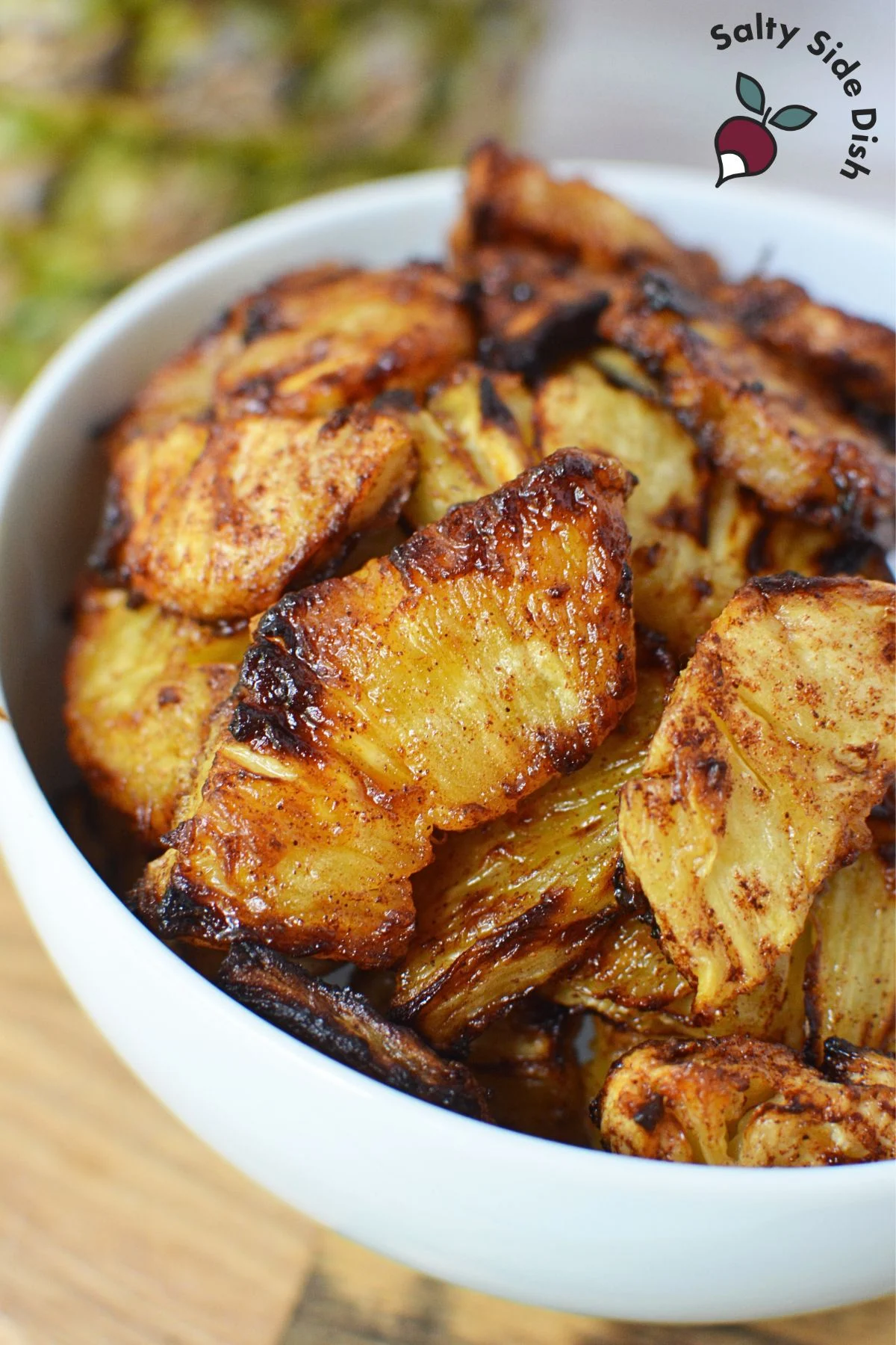 air fryer pineapple in a bowl.