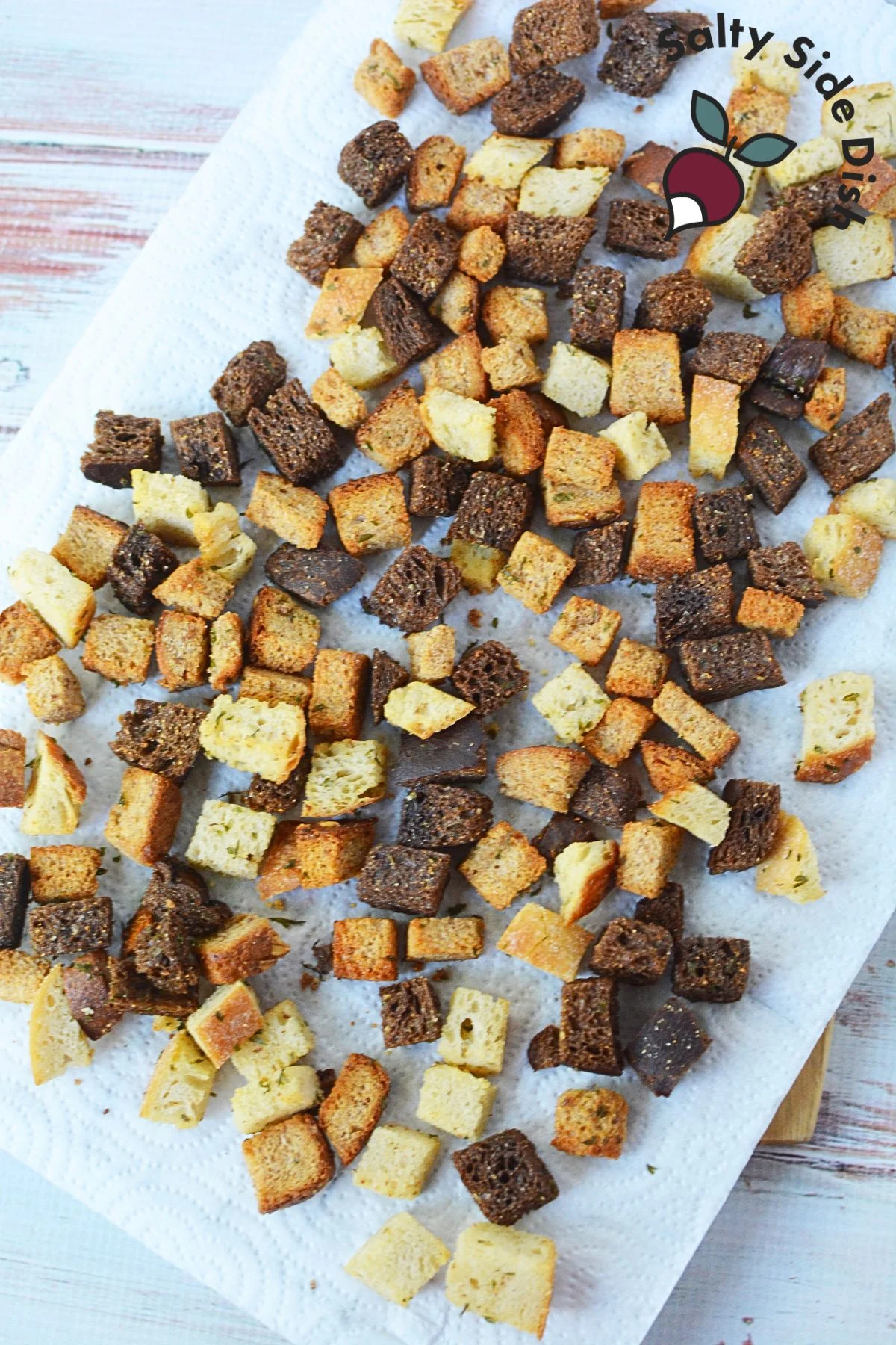 layer of croutons drying on a sheet