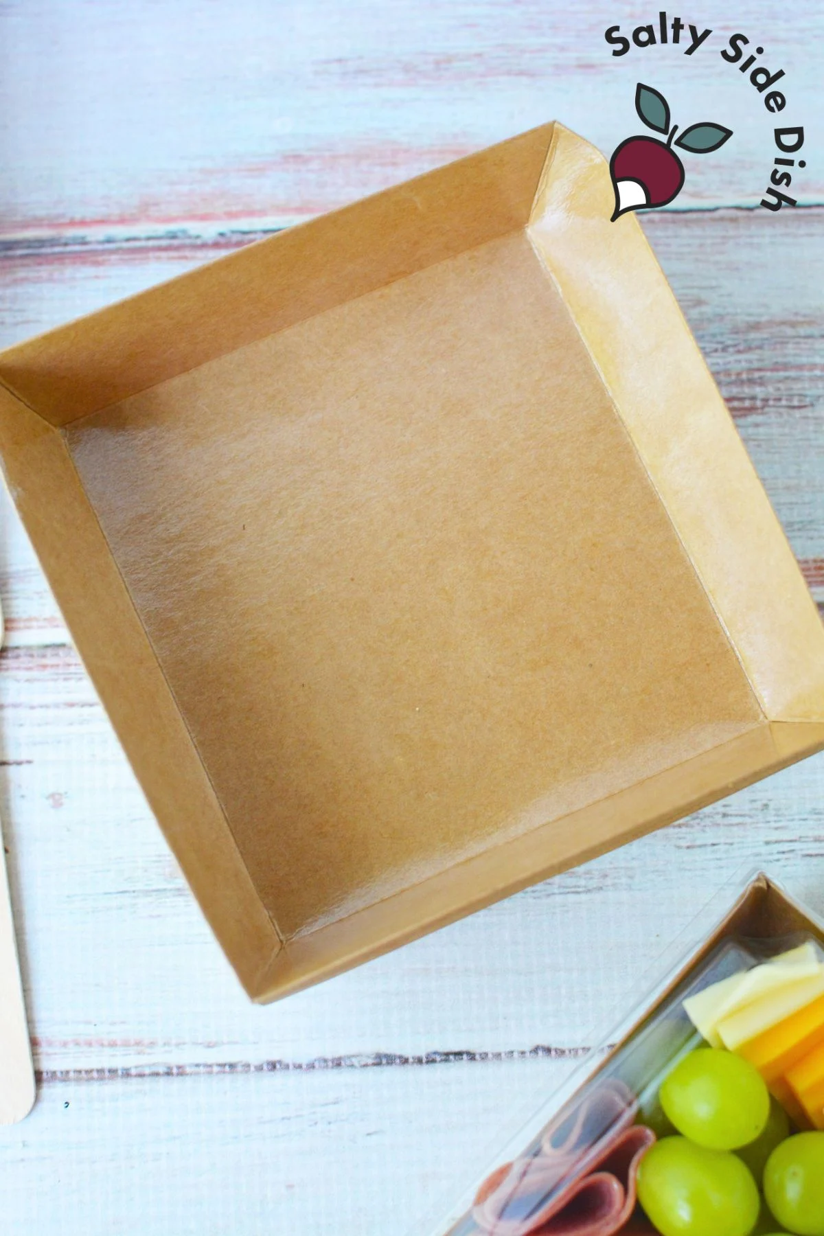 mini paper boxes for portable charcuterie boards.