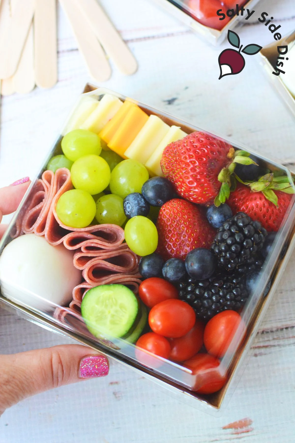 assemble charcuterie boxes with ease at home for less cost and individualized ingredients.