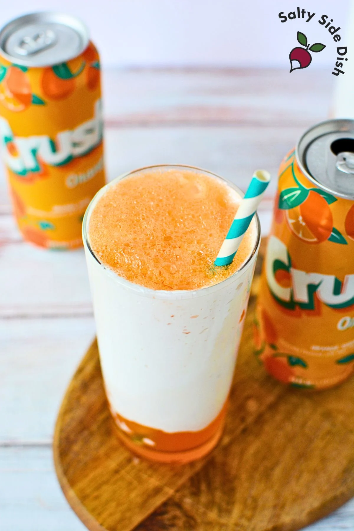adding orange soda in a glass. easy tiktok recipe.