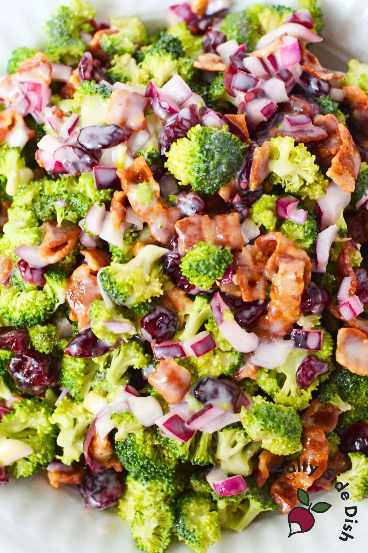 close up image of broccoli bacon cranberry salad.