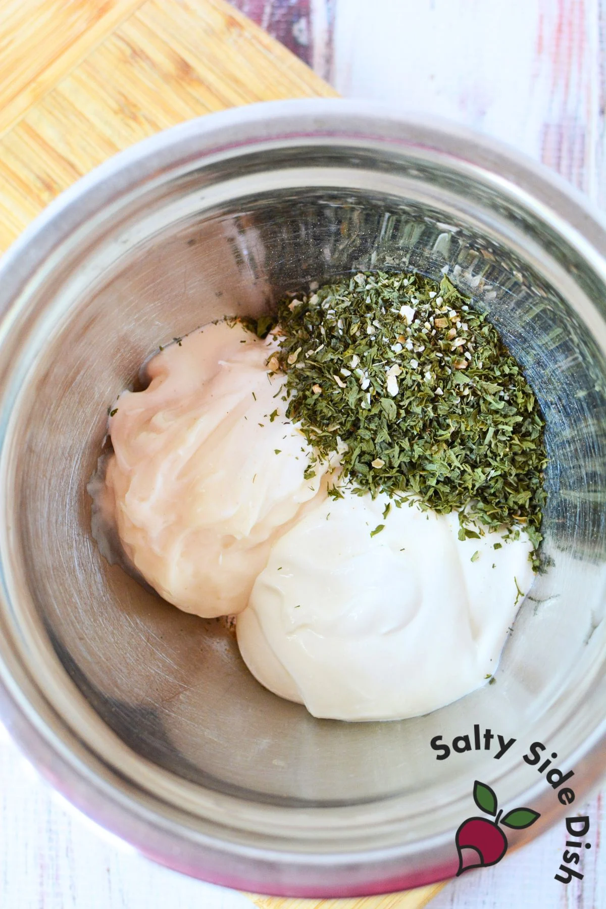 combining dry mix with other ingredients to create a light dip.