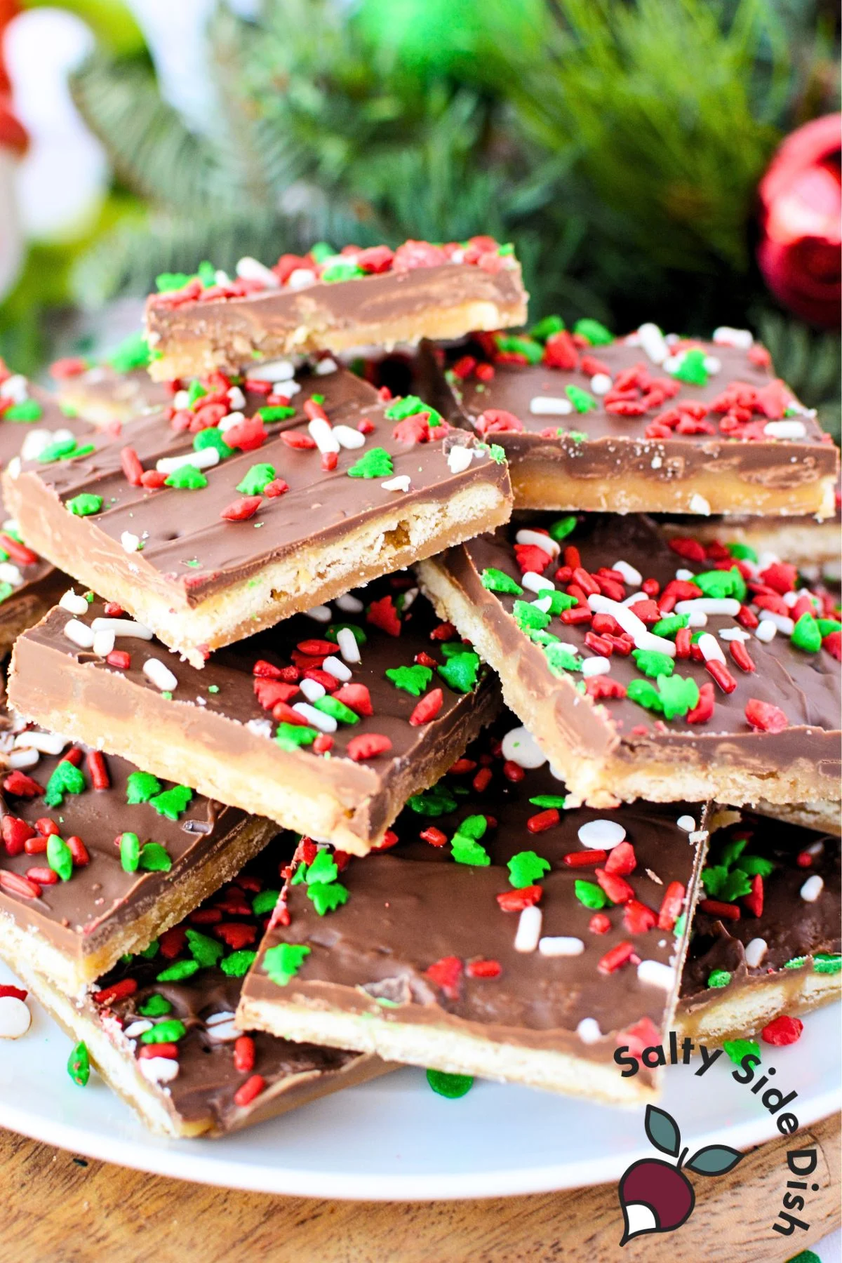 plate of saltine crackers with chocolate and sprinkles.