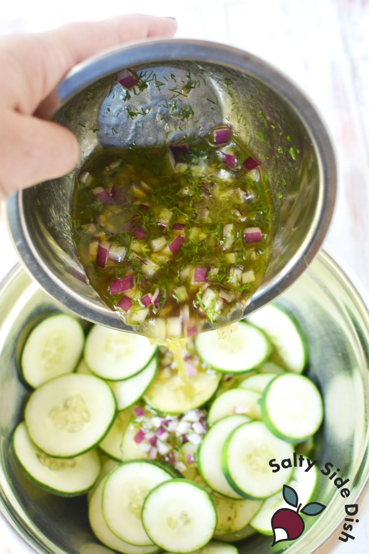 Combine brine and sliced cucumbers together to marinate for at least an hour.