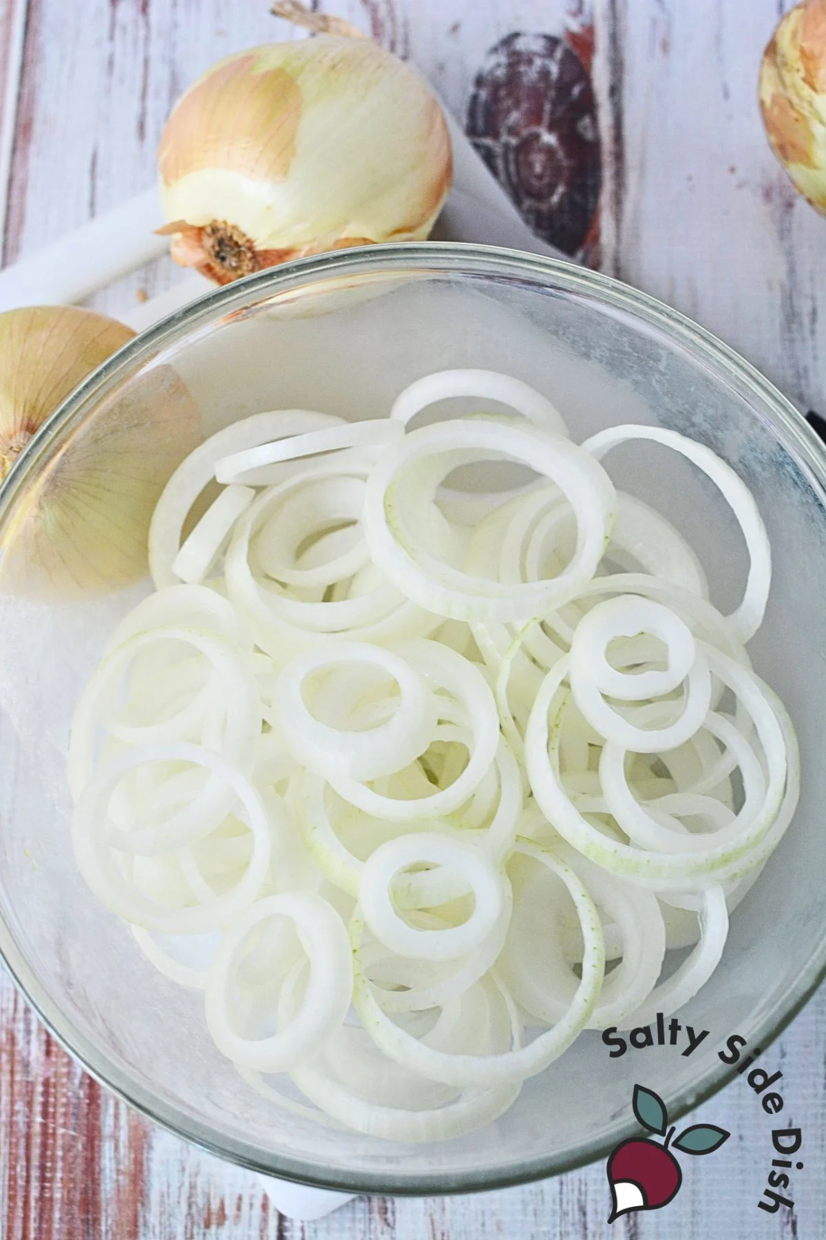Sliced white onions prepared in a bowl for onion salad