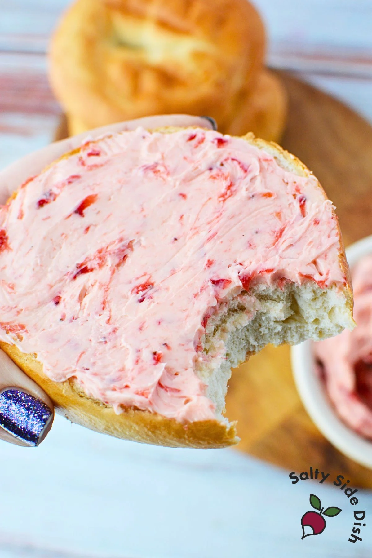 strawberry butter on a piece of toast.