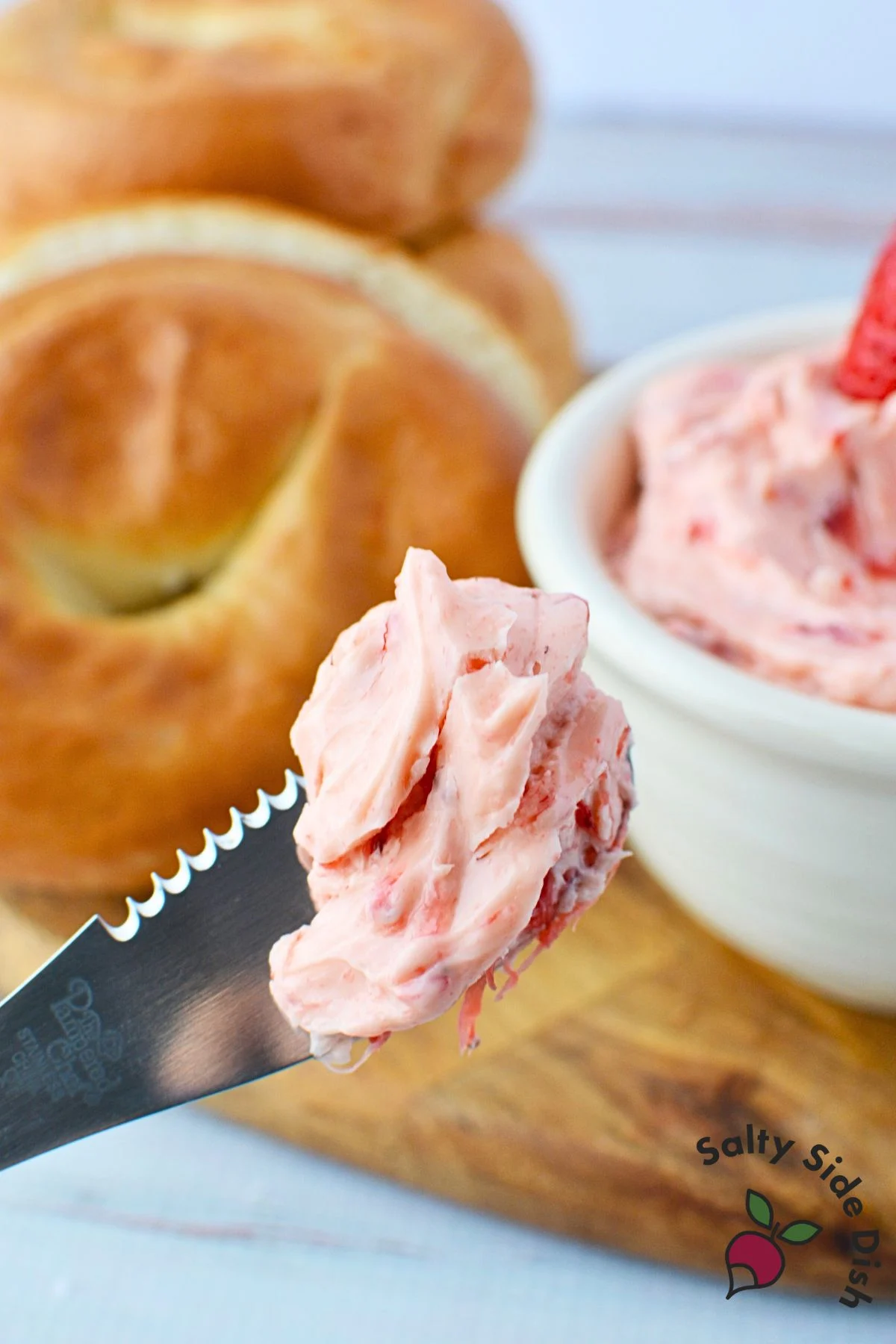 strawberry butter on a knife.